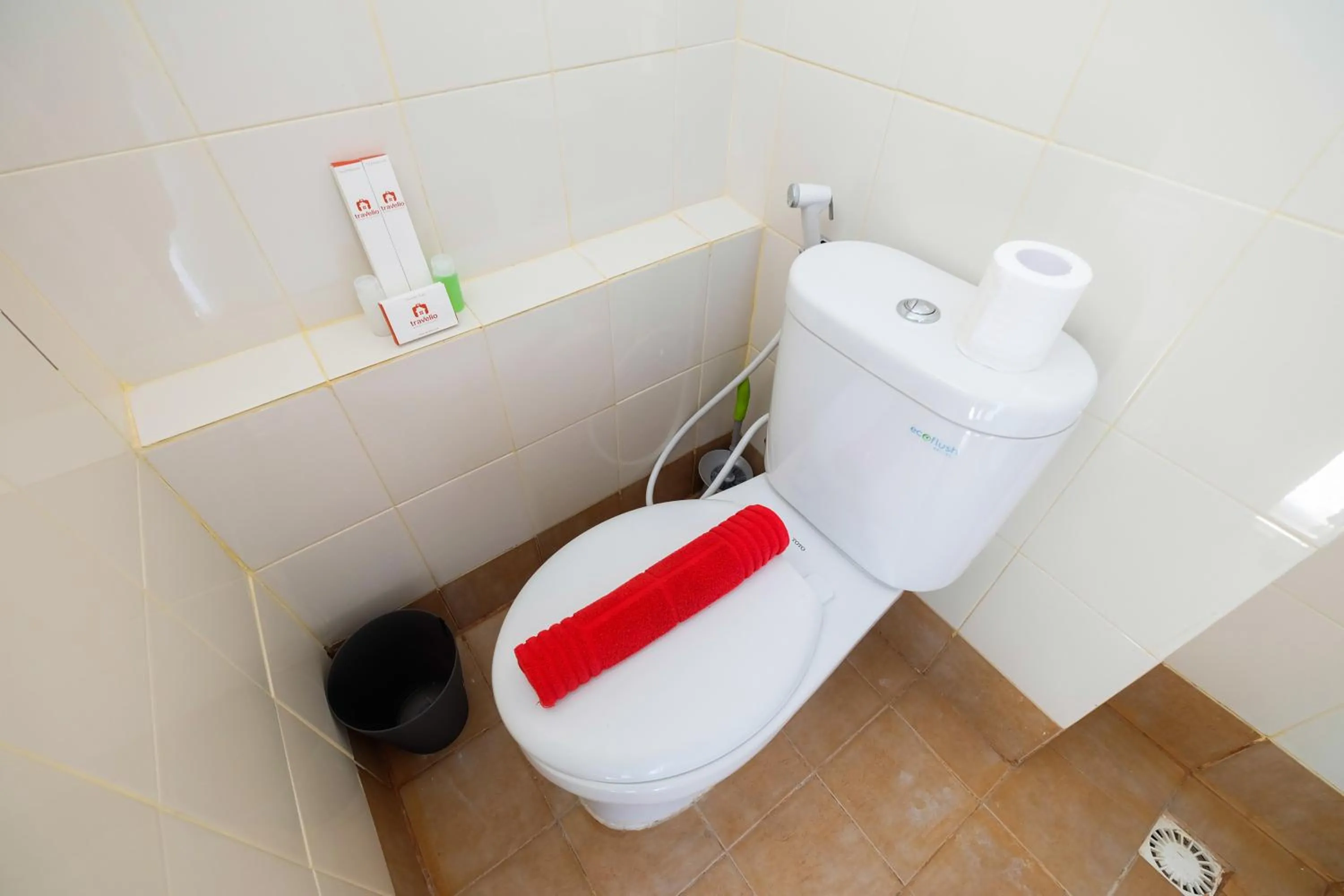 Toilet in Modern Studio Bassura City Apartment By Travelio