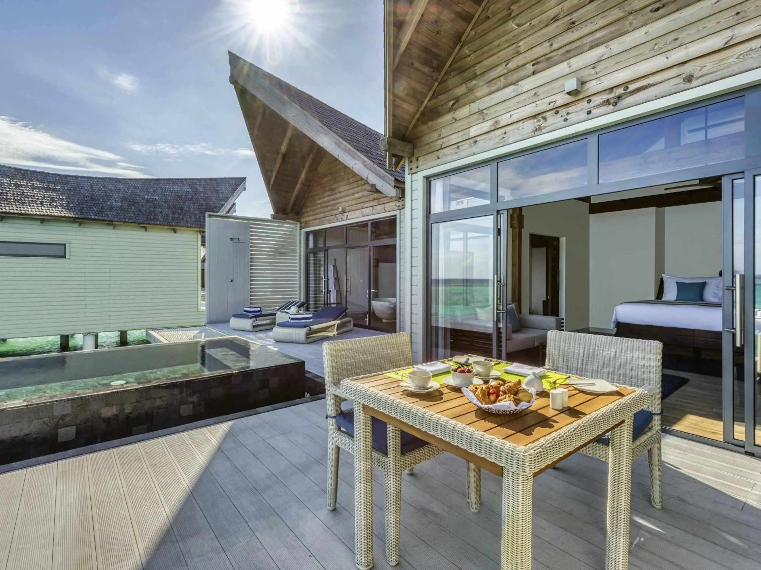 Bedroom in Kuredhivaru Resort and Spa - Maldives Bedroom in Kuredhivaru Resort and Spa - Maldives