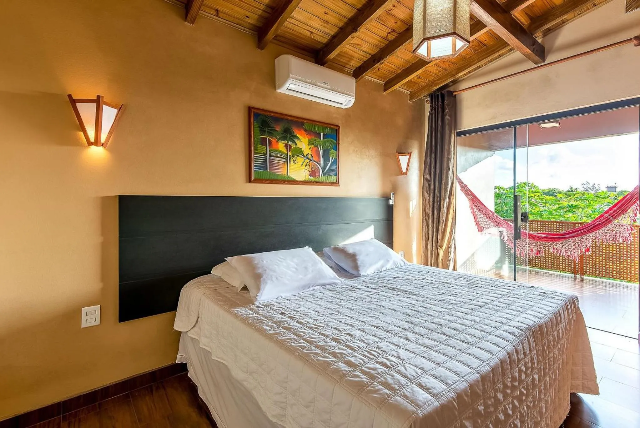 Balcony/Terrace, Bed in Pousada Bangalôs do Rosa