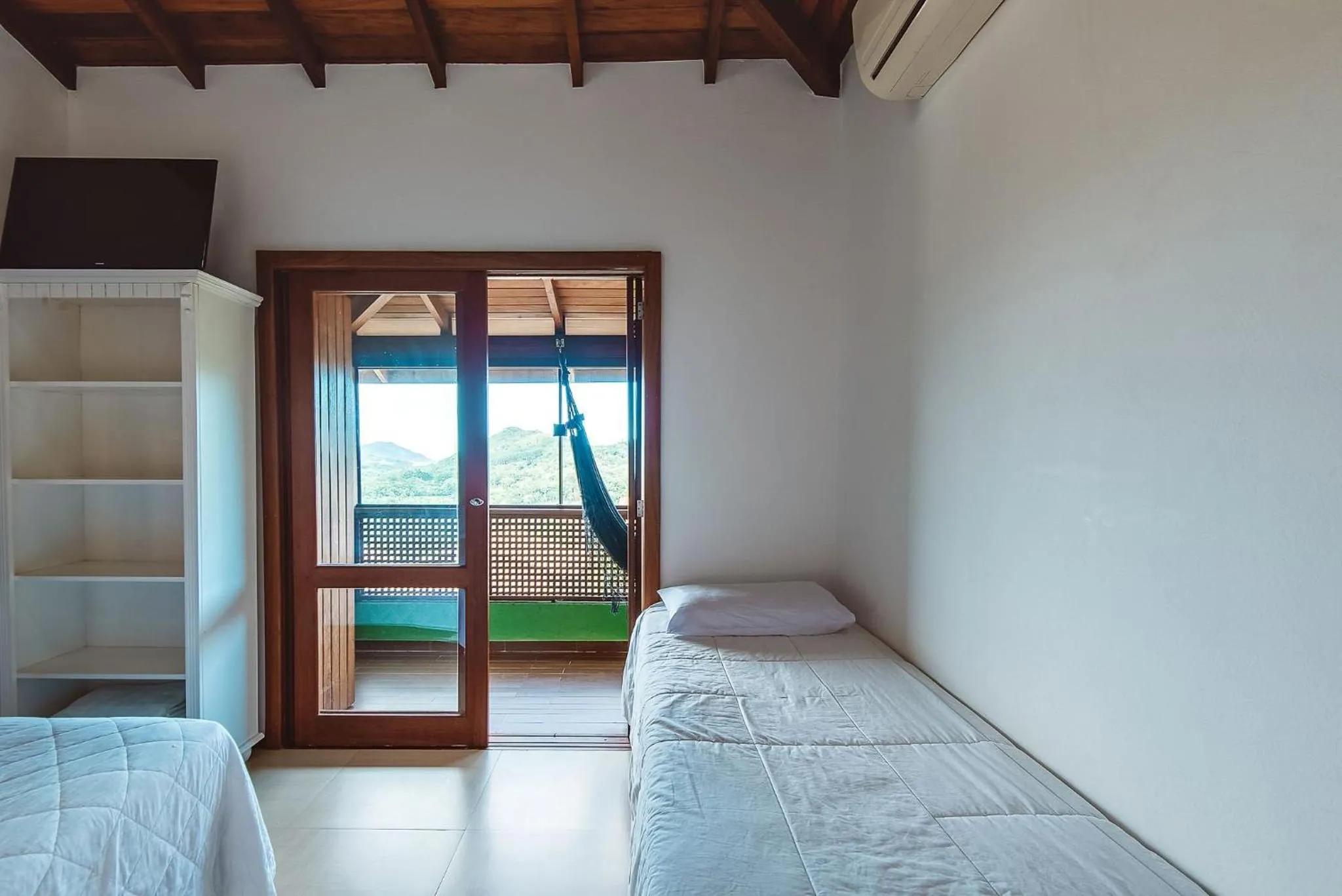 Balcony/Terrace, Bed in Pousada Bangalôs do Rosa