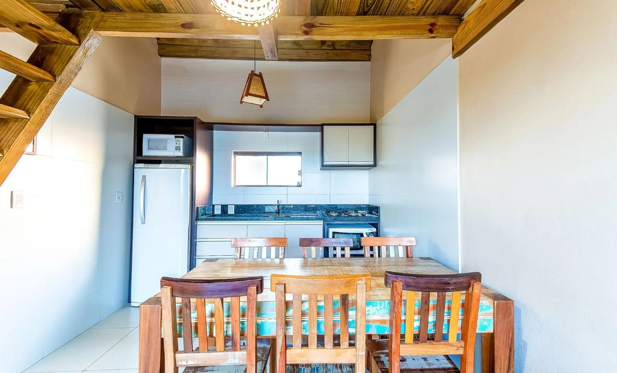 Kitchen or kitchenette in Pousada Bangalôs do Rosa