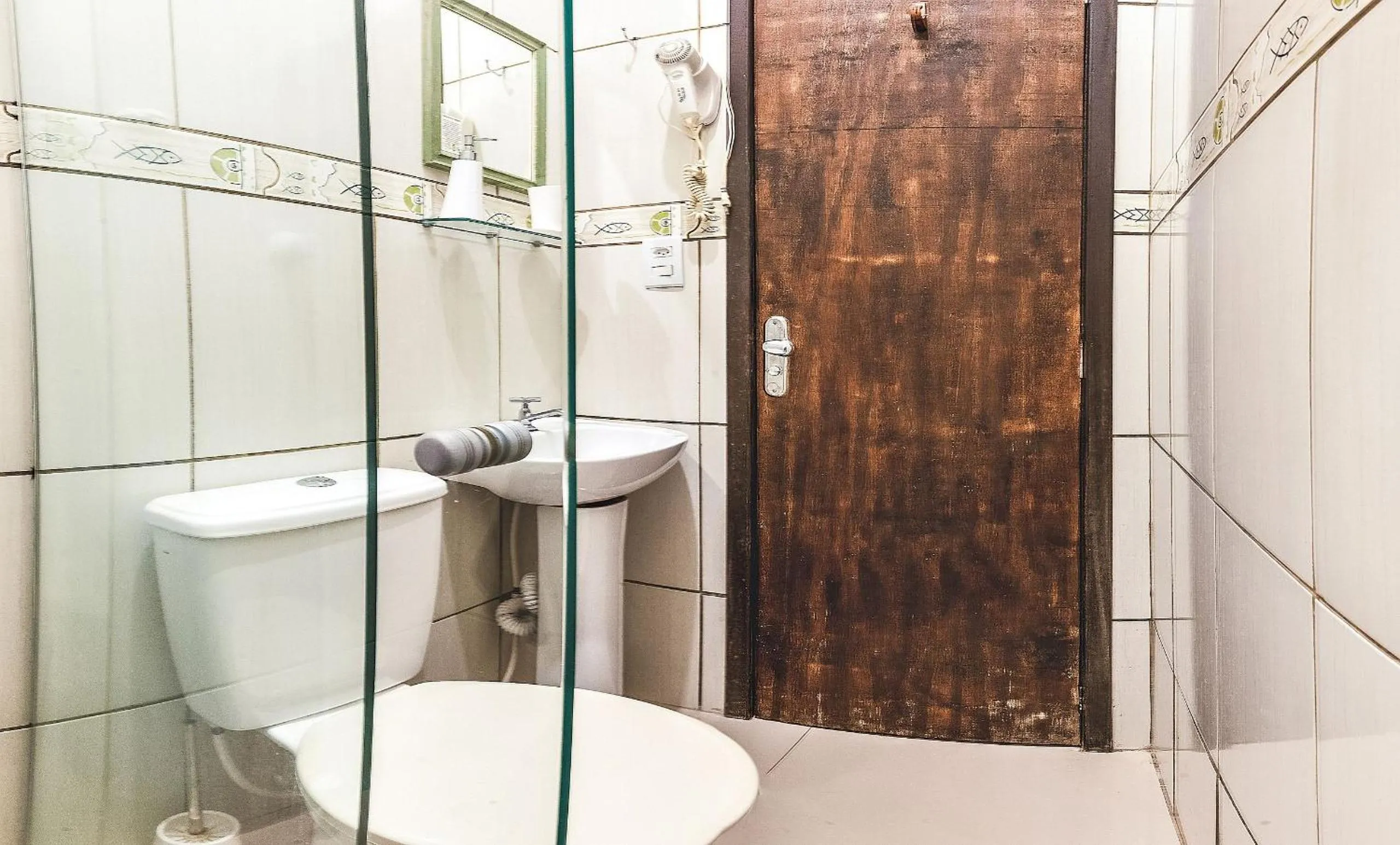 Toilet in Pousada Bangalôs do Rosa