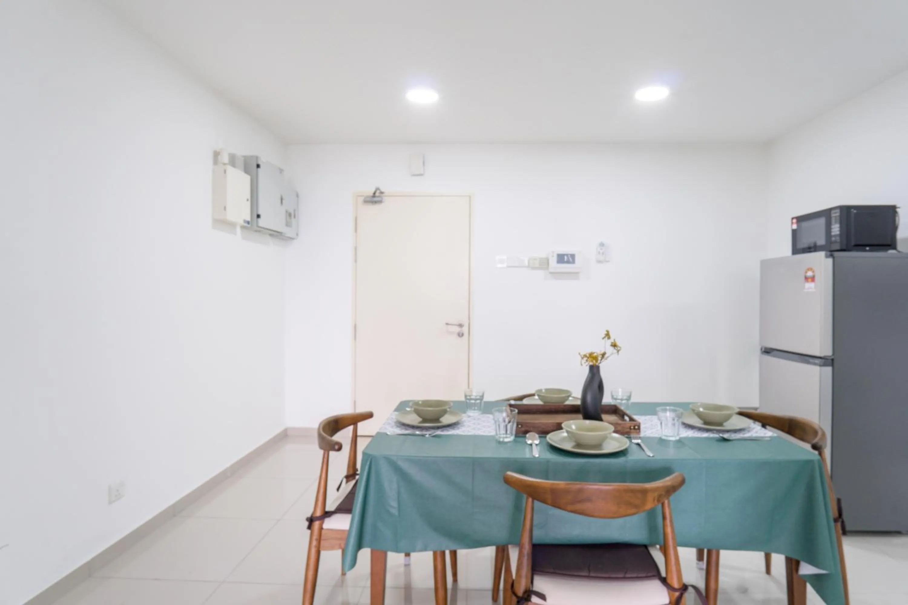 Dining area in Encorp Strand Residences by Airhost