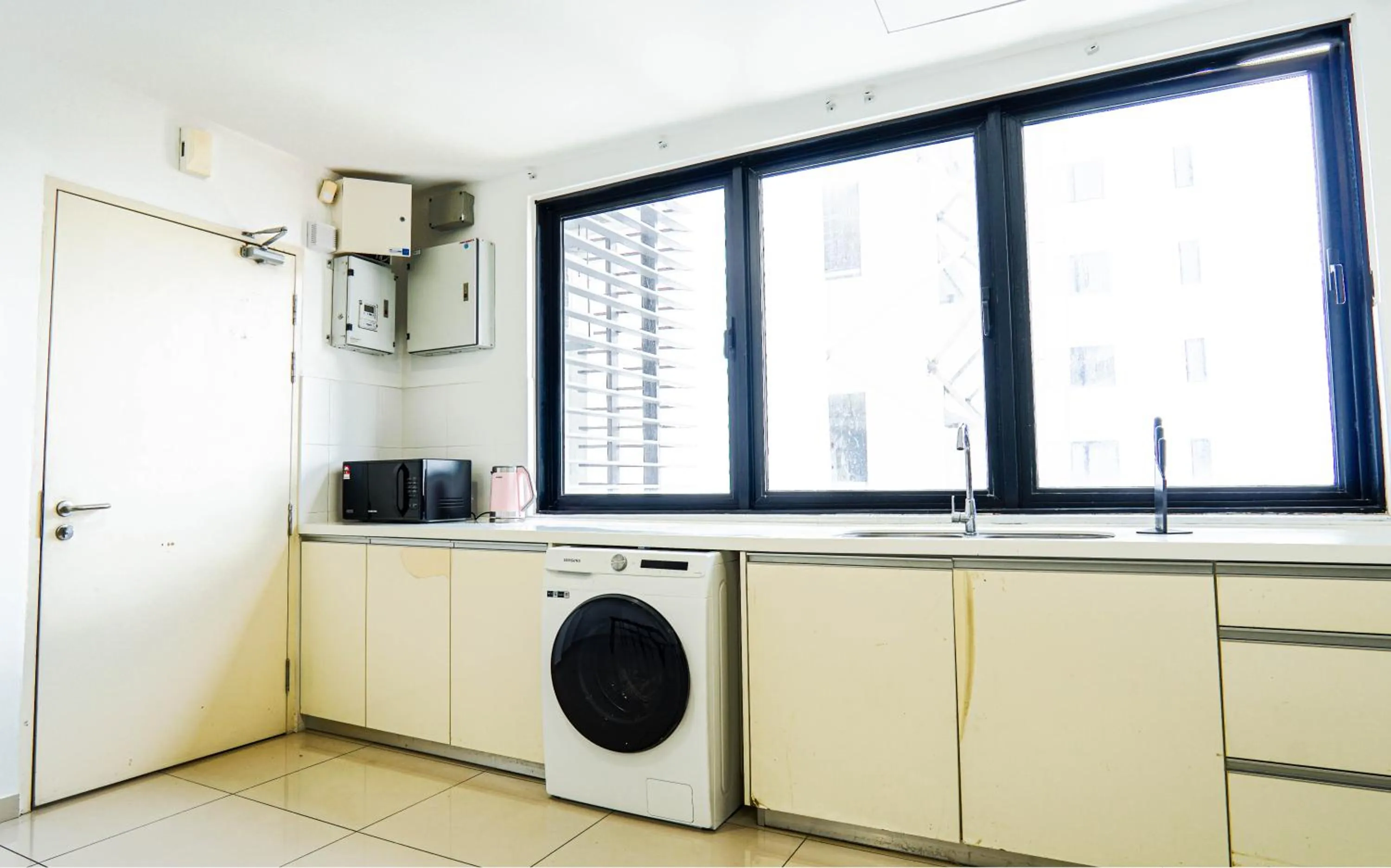 Kitchen or kitchenette in Encorp Strand Residences by Airhost