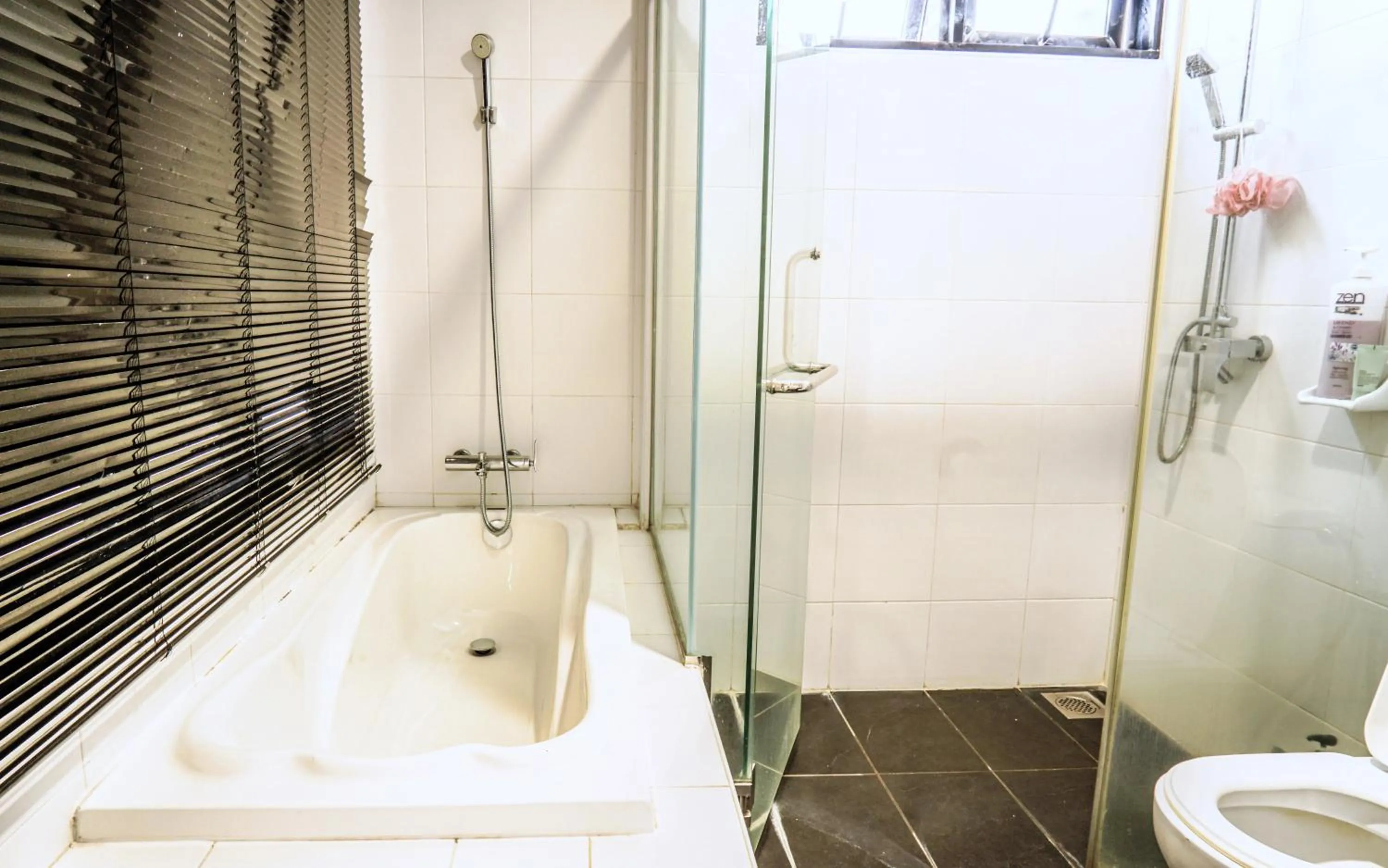 Shower in Encorp Strand Residences by Airhost