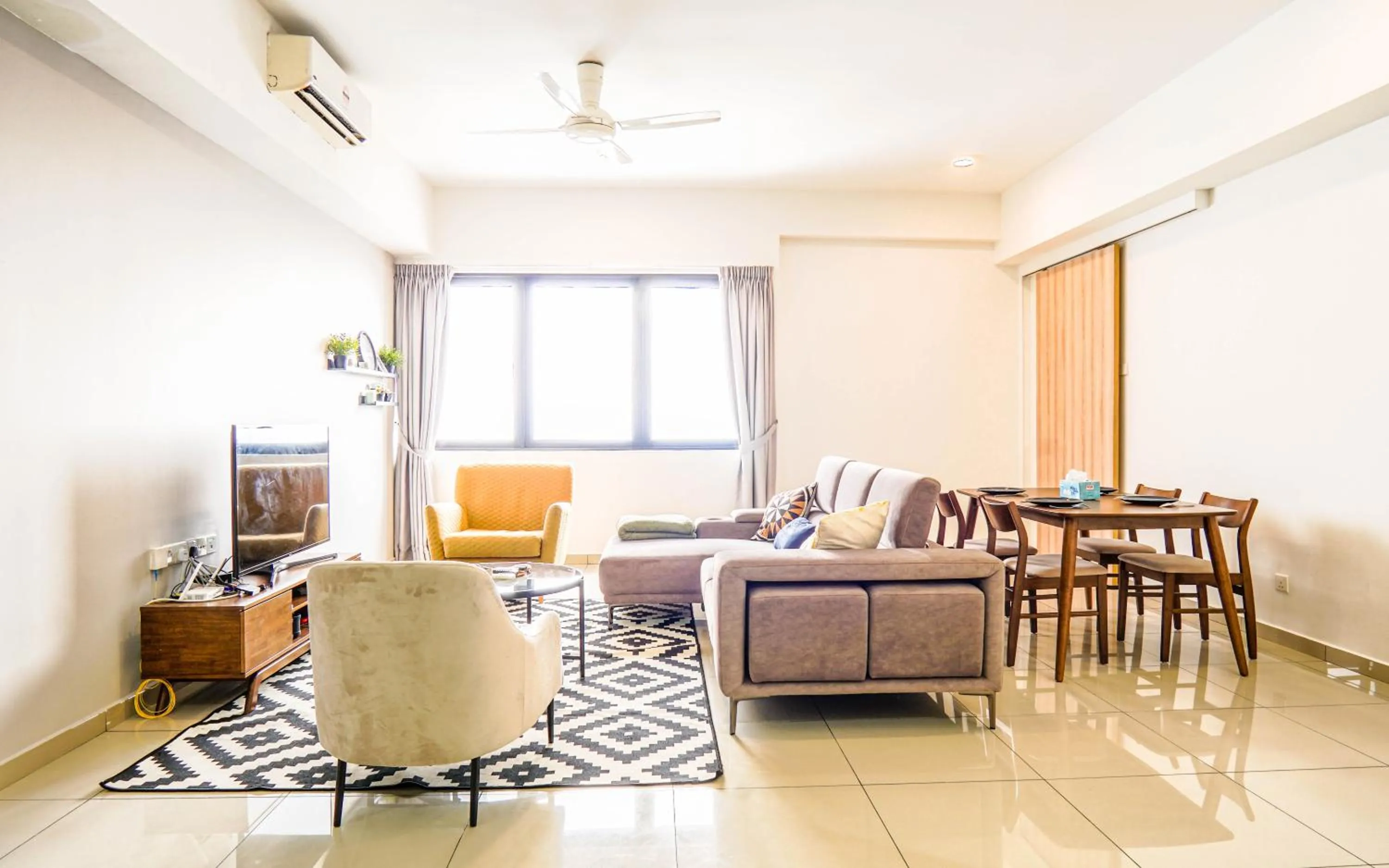 Living room in Encorp Strand Residences by Airhost