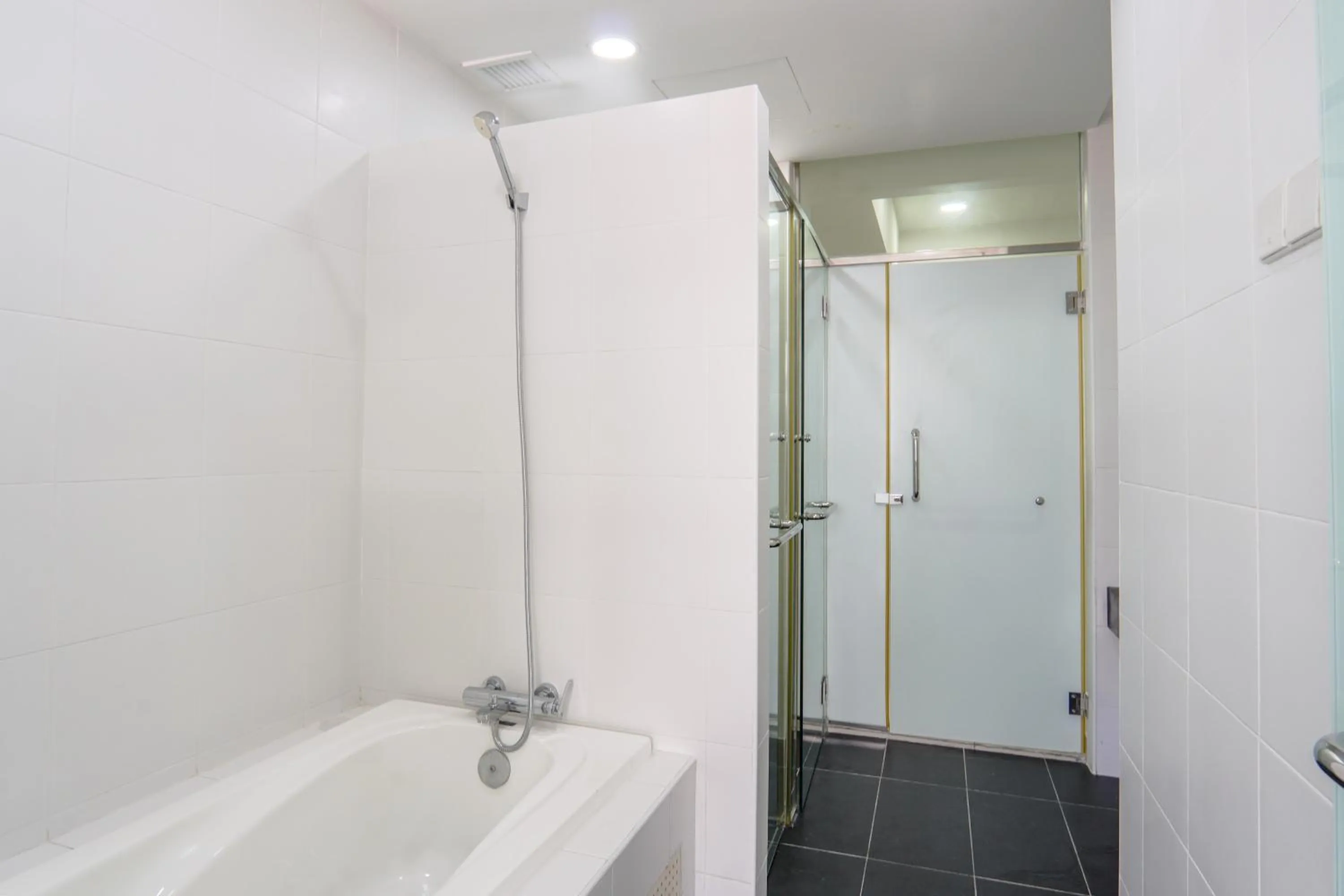 Shower in Encorp Strand Residences by Airhost