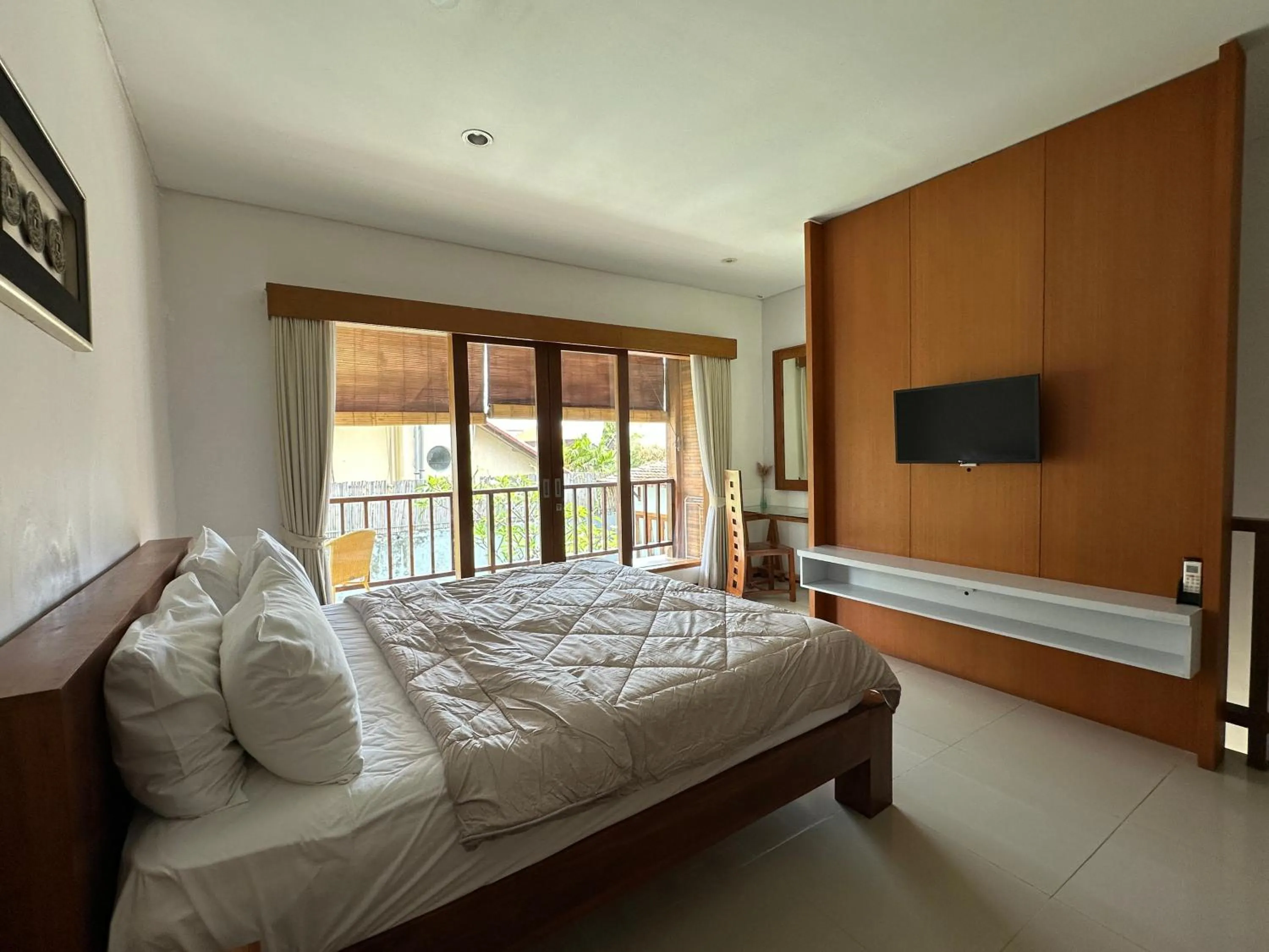 Bed in Balcony Living Apartment