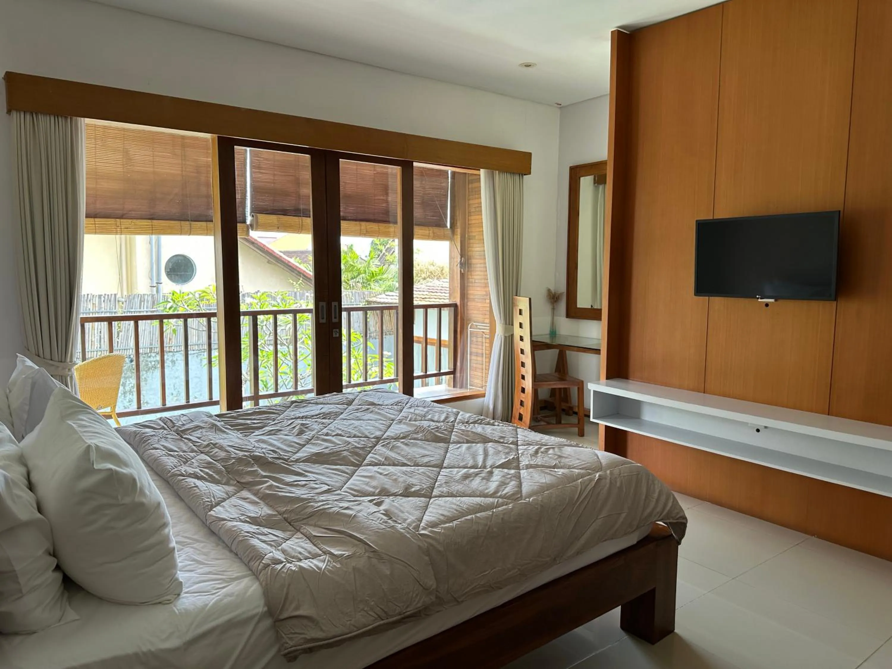 Bed in Balcony Living Apartment