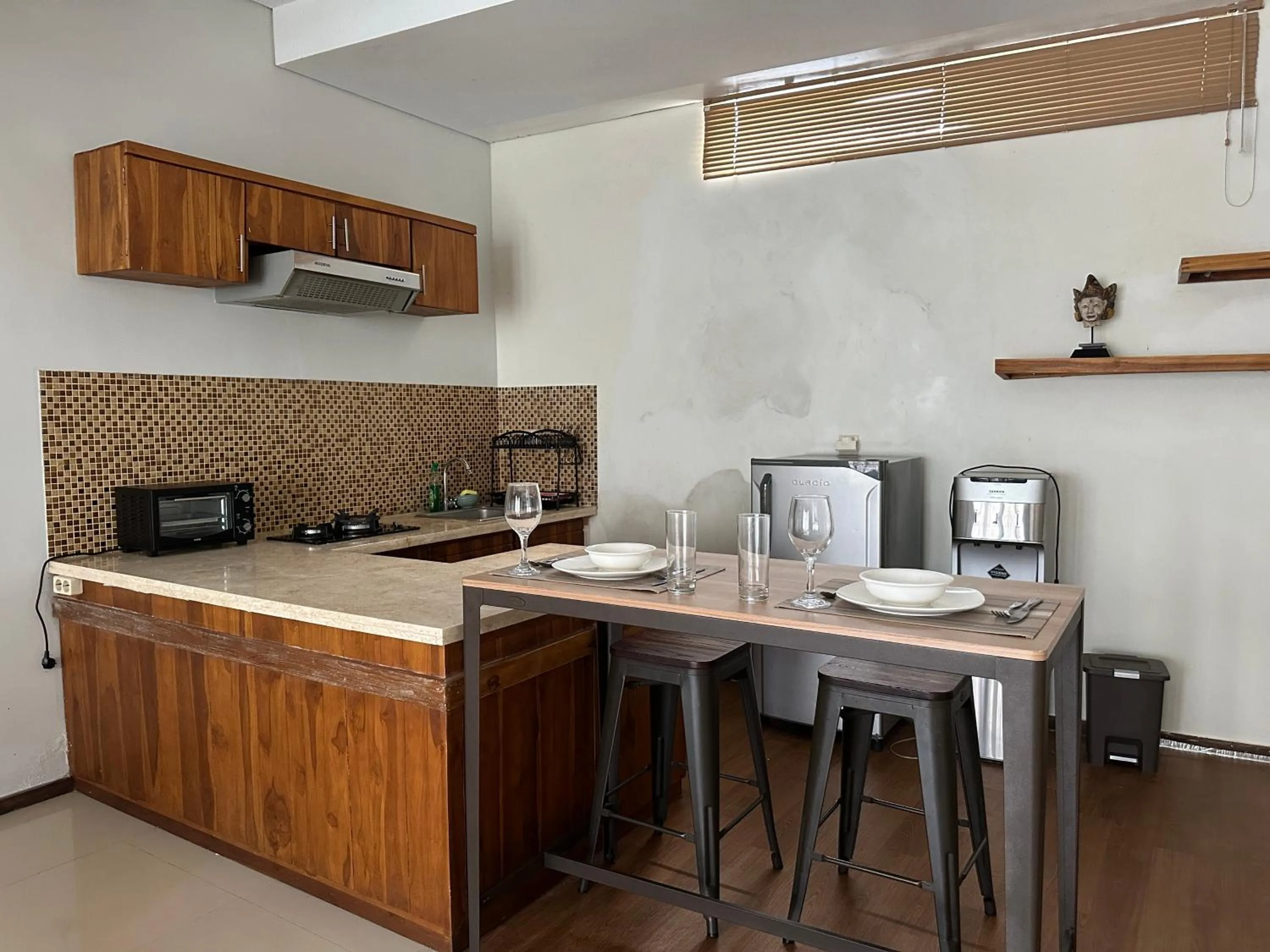 Kitchen or kitchenette in Balcony Living Apartment