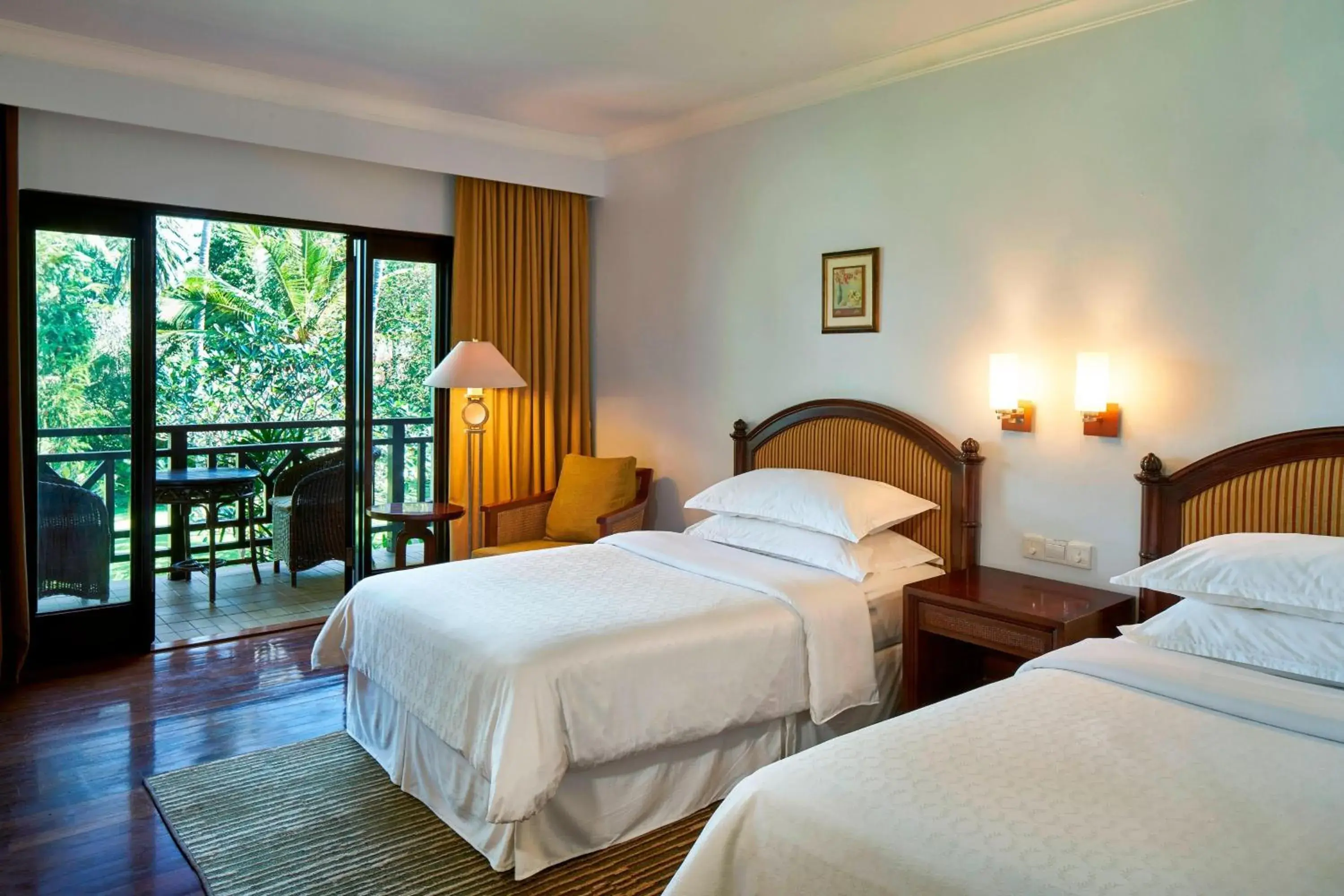 Photo of the whole room, Bed in Sheraton Senggigi Beach Resort