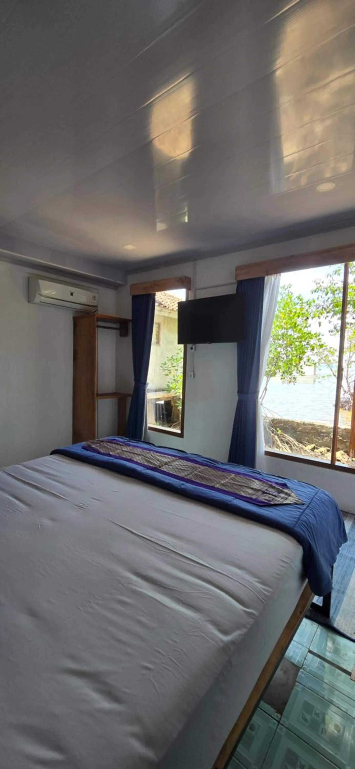 Bed in Omah Alchy Cottages