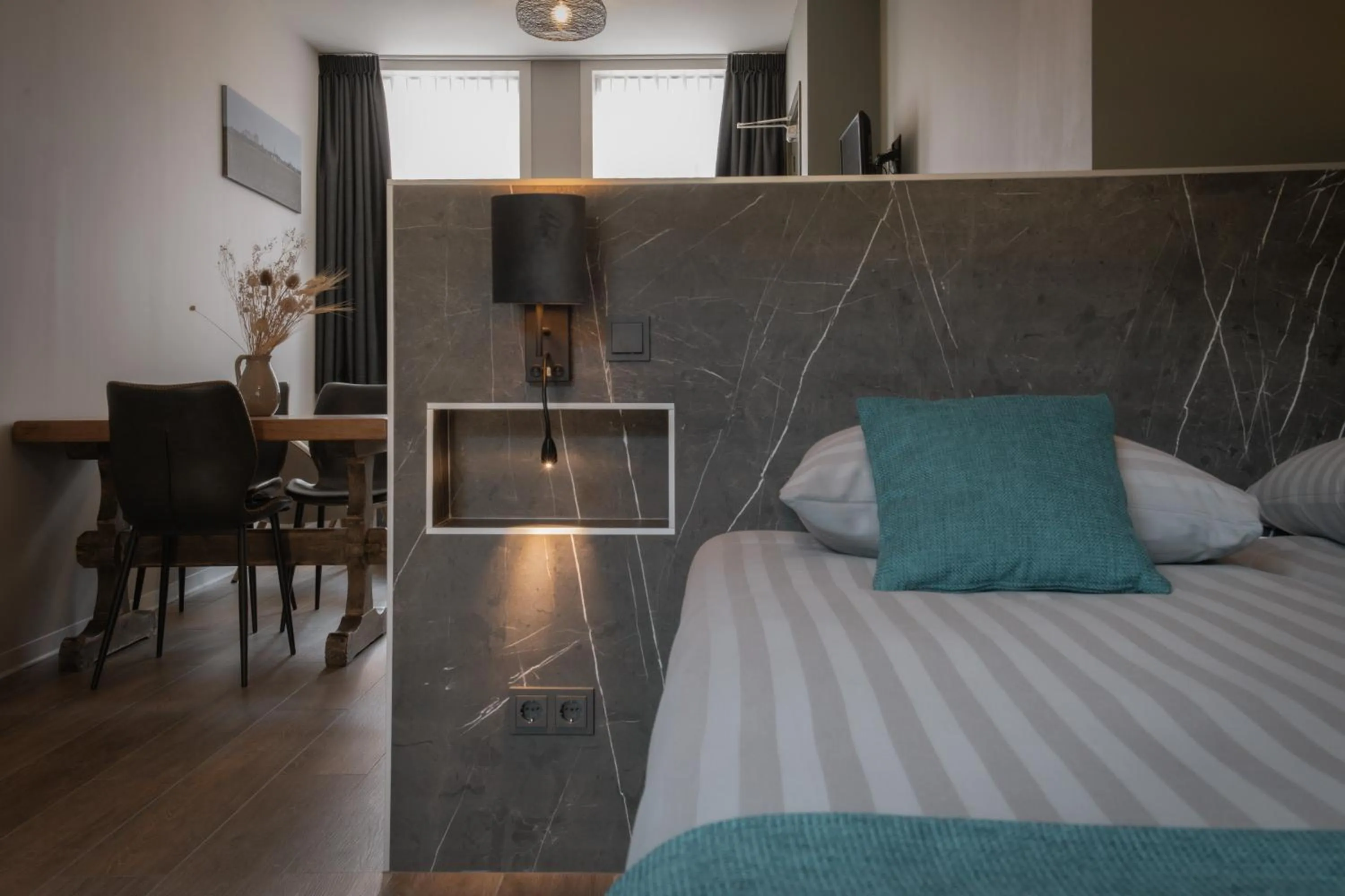 Seating area, Bed in Hotel Groede