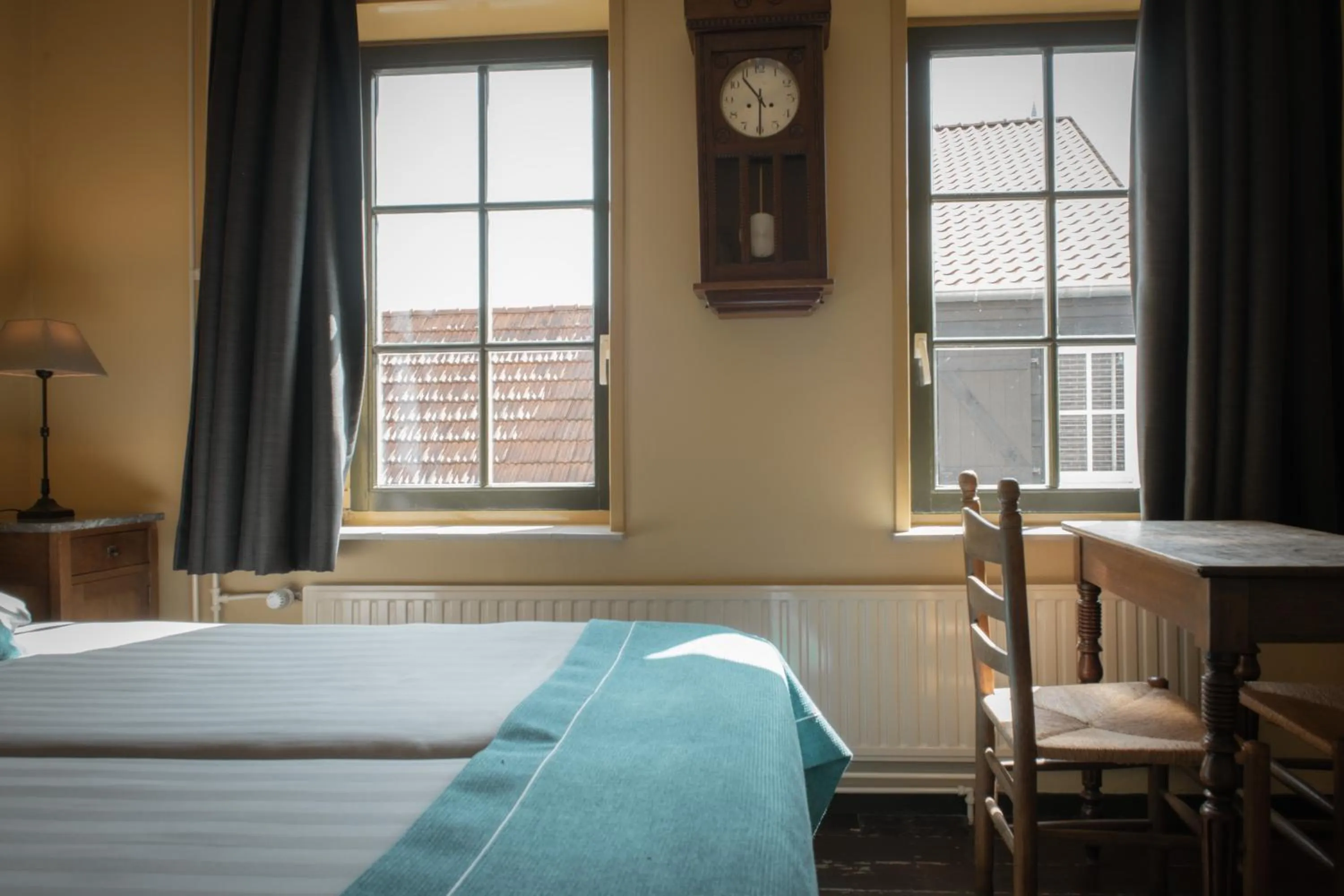 Seating area, Bed in Hotel Groede