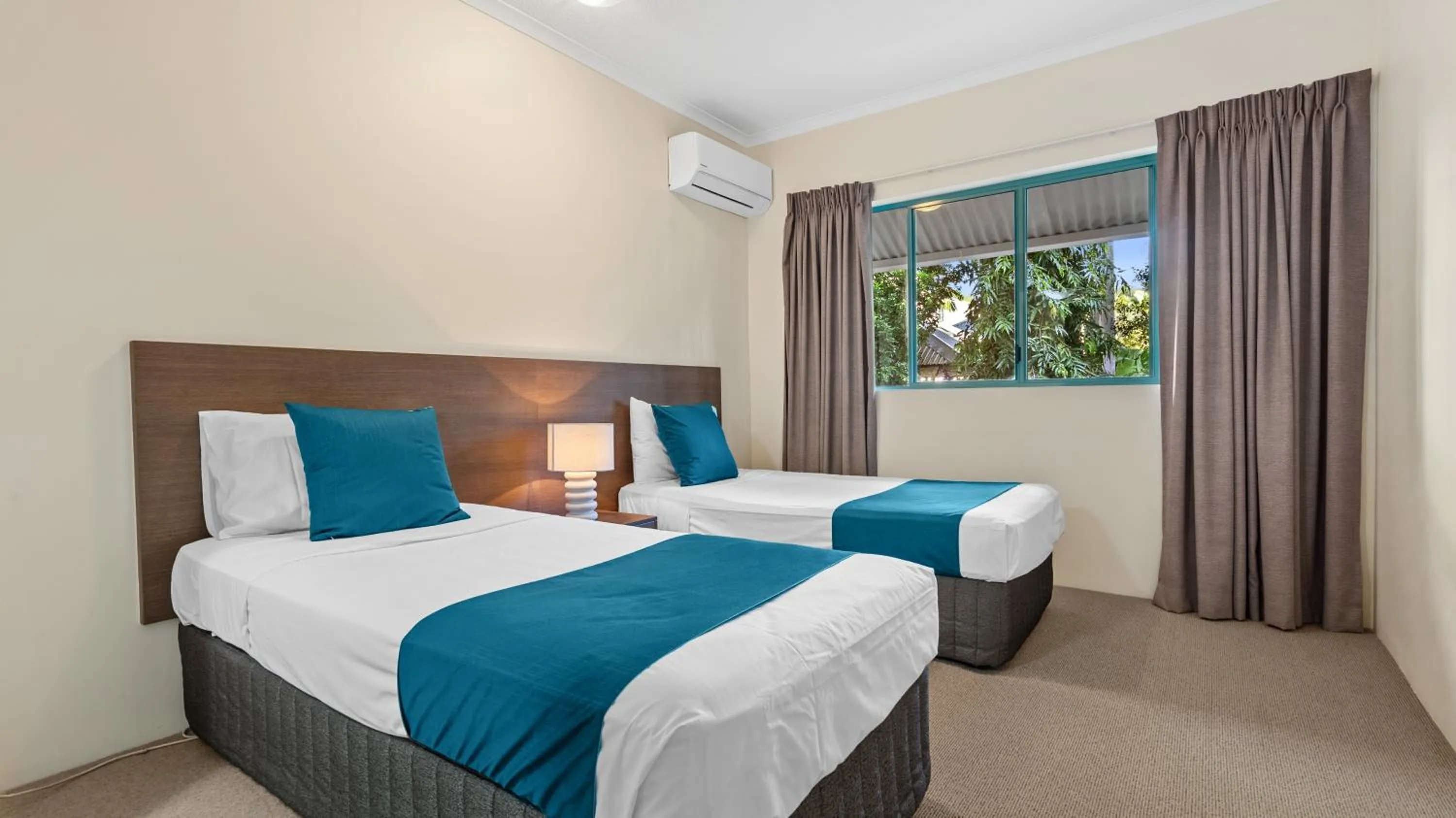 Bed in Coral Sands Beachfront Resort