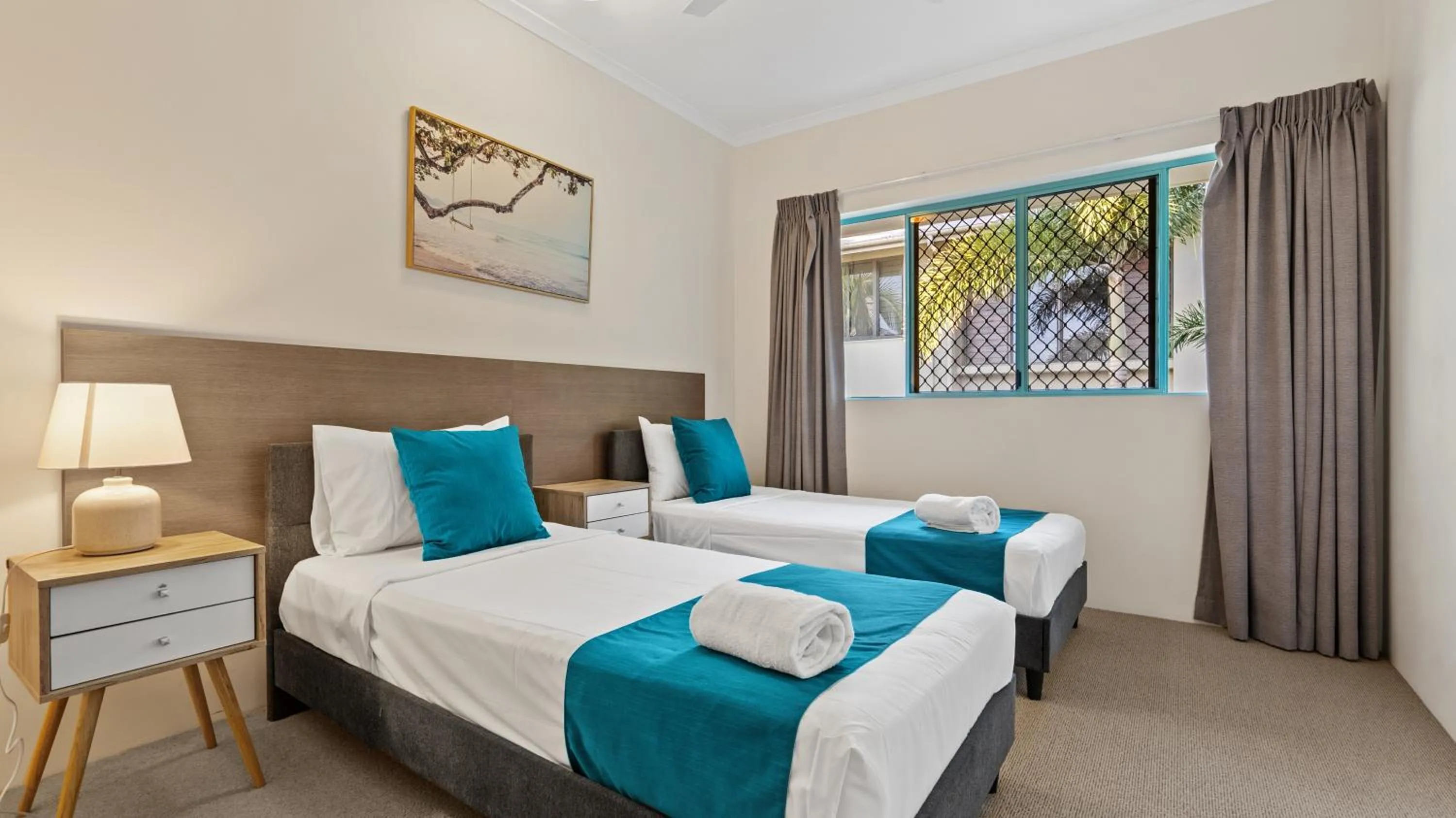 Bed in Coral Sands Beachfront Resort