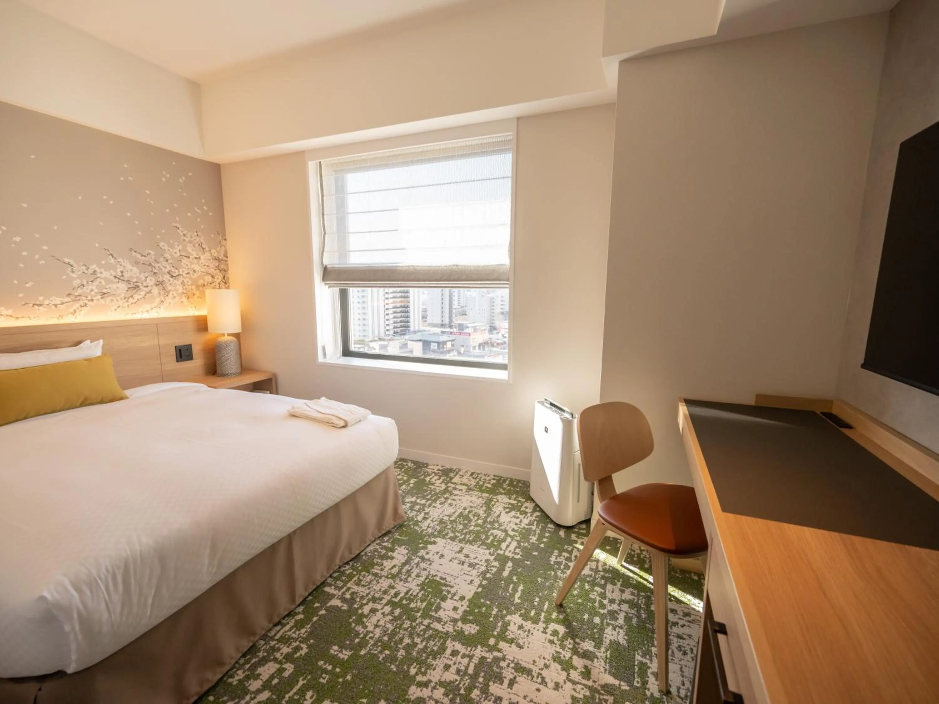 Bed in Hotel Terrace the Garden Mito