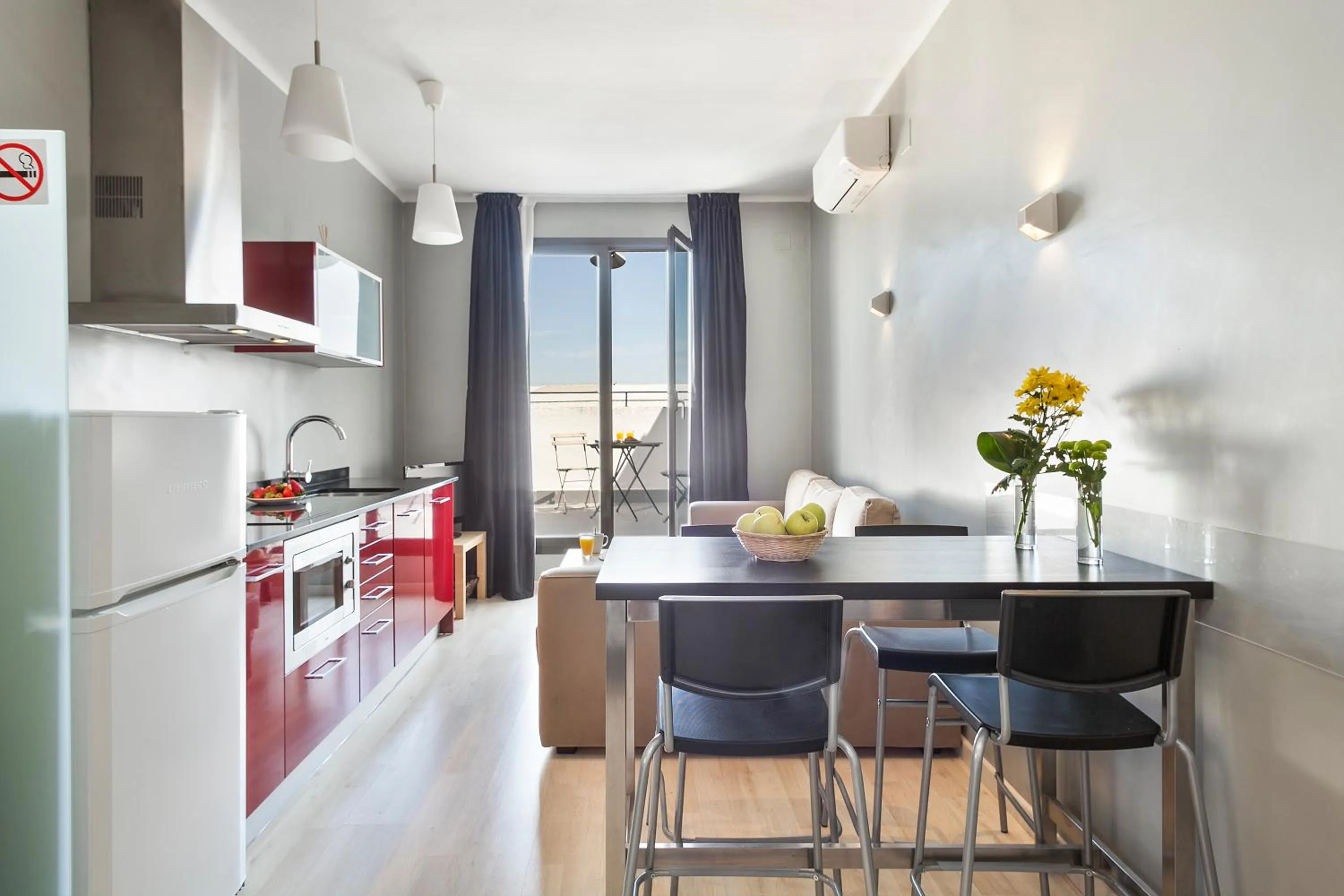 Living room in Fira Apartments by gaiarooms