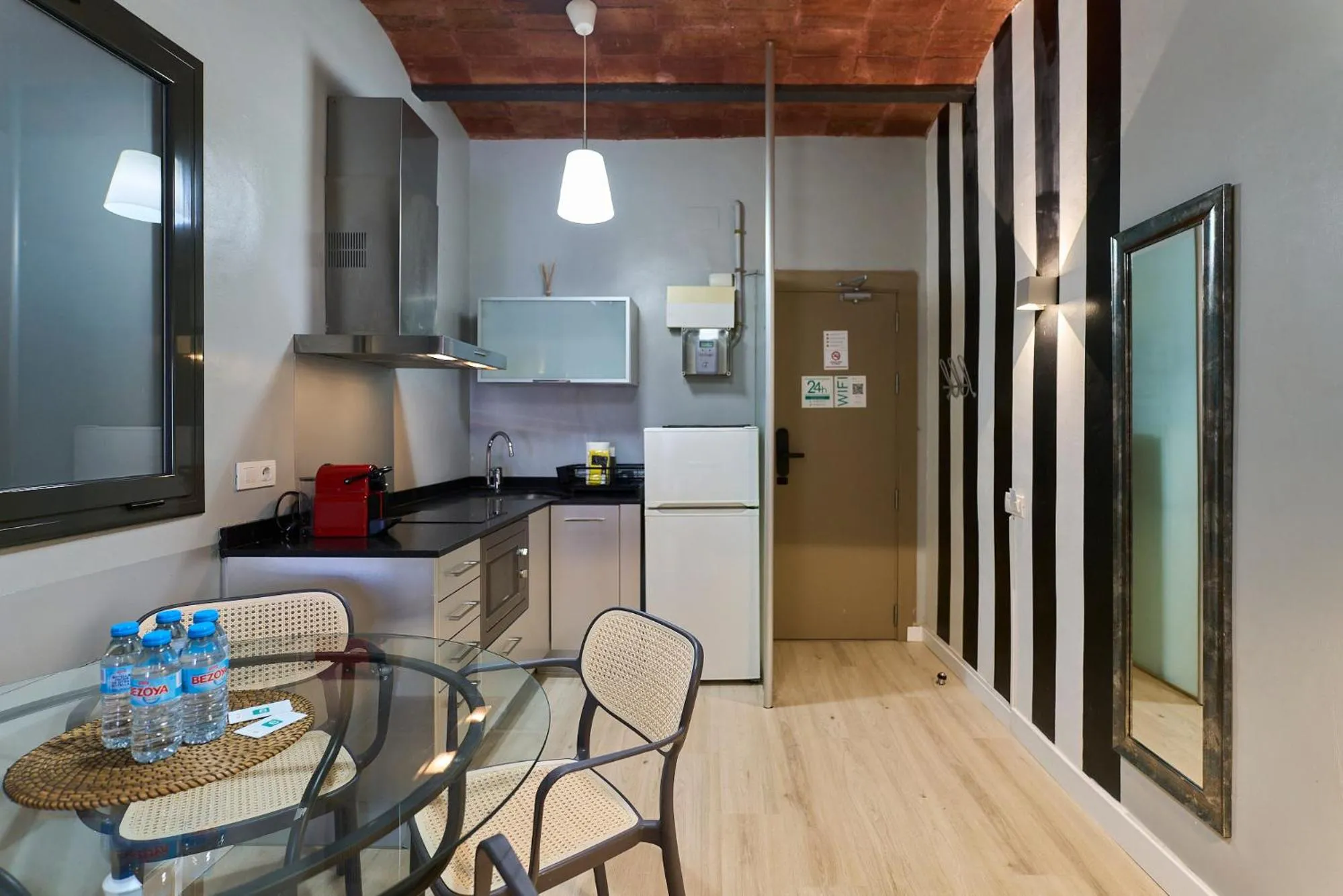 Kitchen or kitchenette in Fira Apartments by gaiarooms