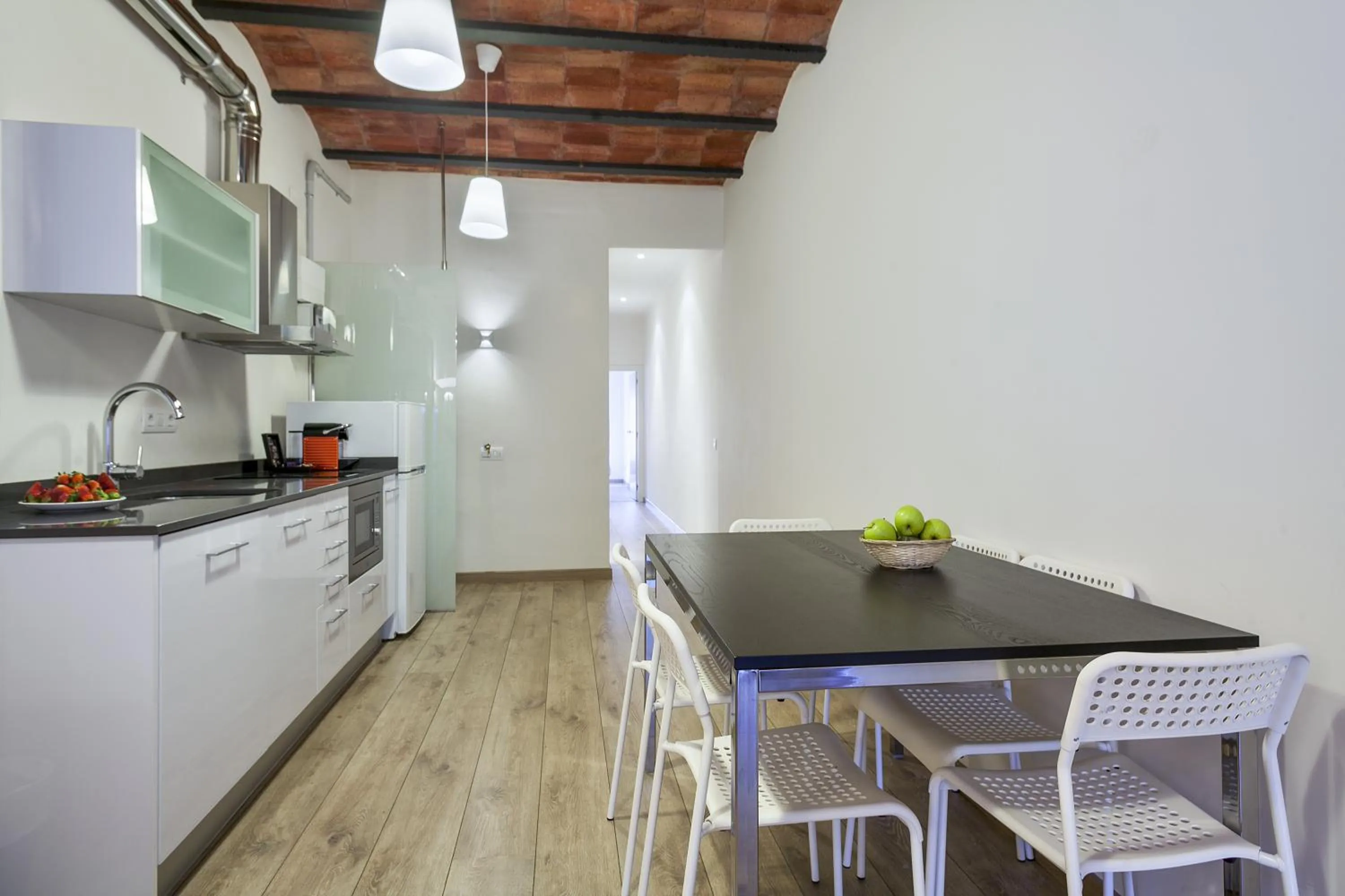 Kitchen or kitchenette in Fira Apartments by gaiarooms
