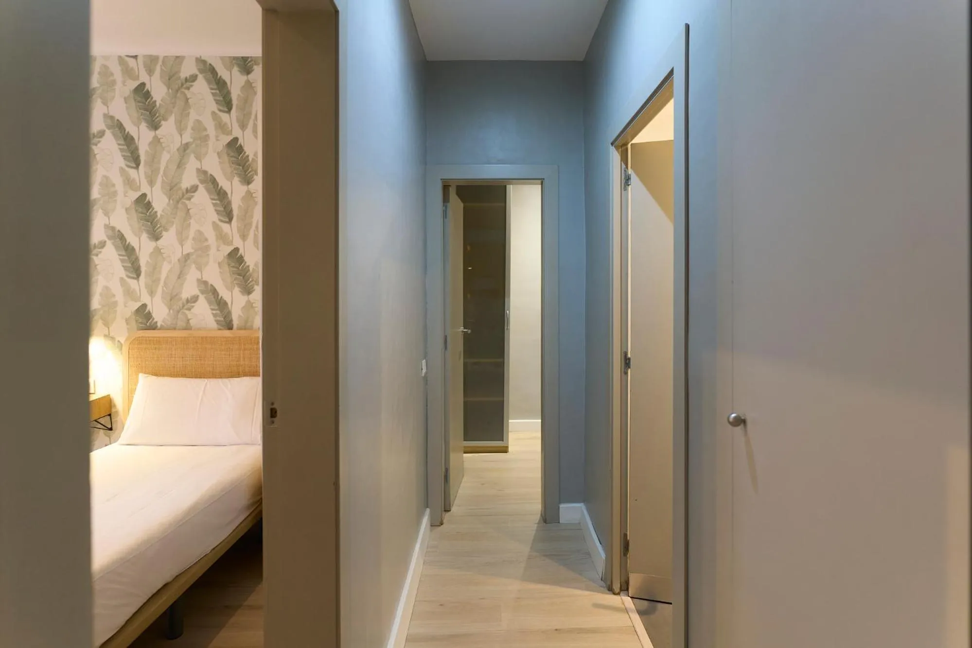 Bed in Fira Apartments by gaiarooms