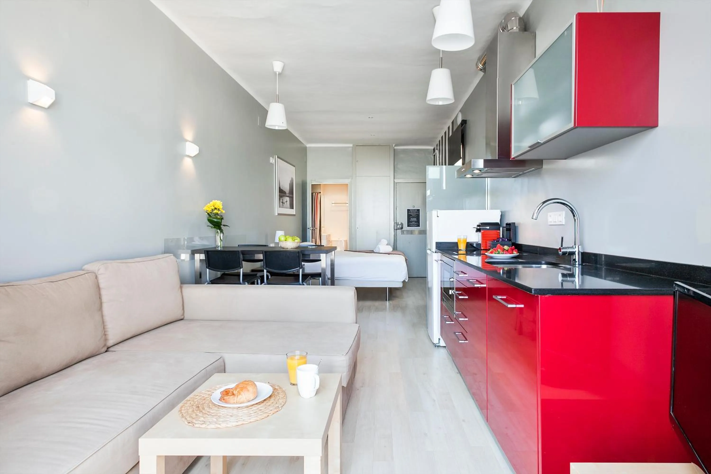 Living room in Fira Apartments by gaiarooms