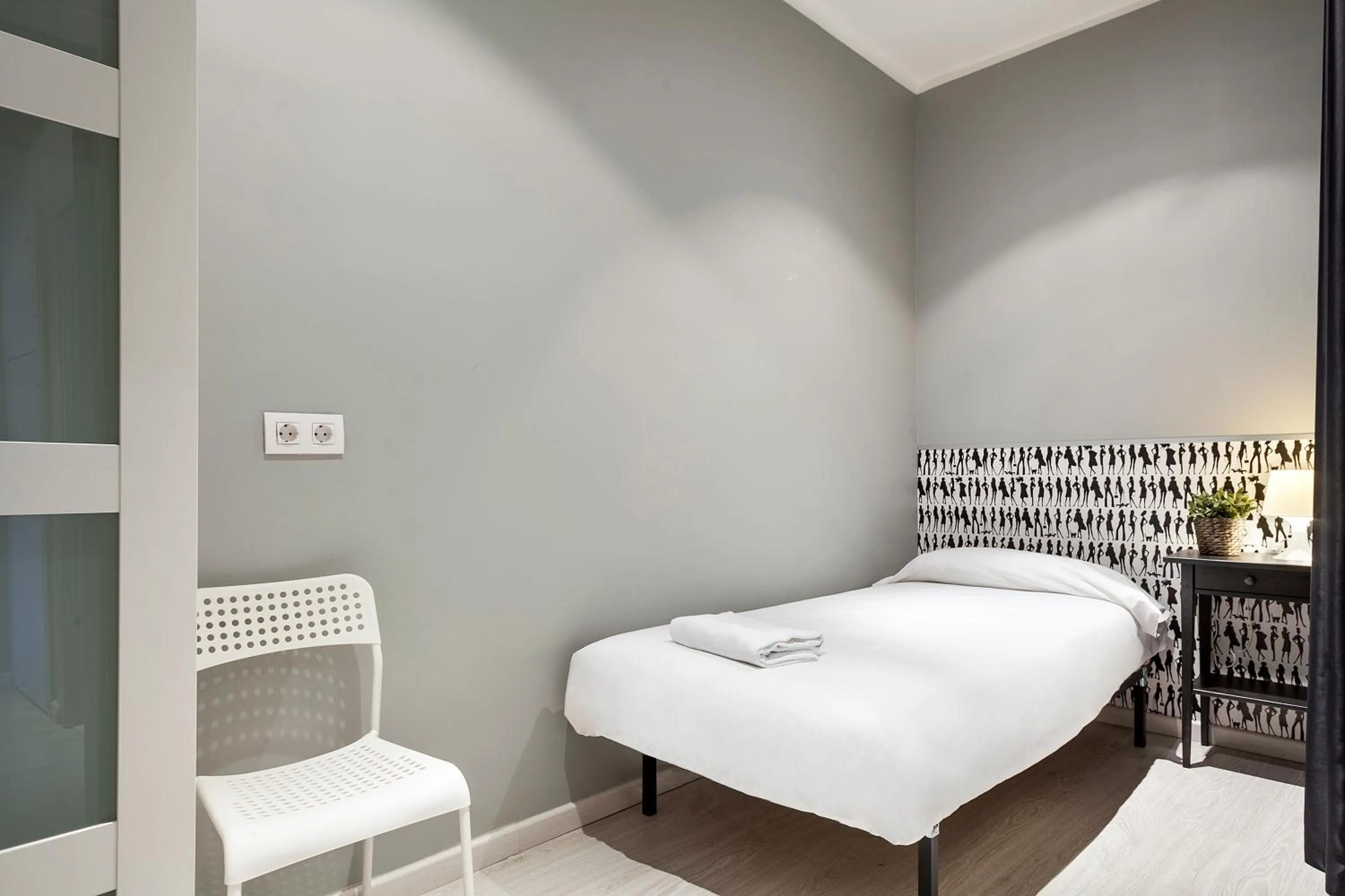 Bedroom, Bed in Fira Apartments by gaiarooms