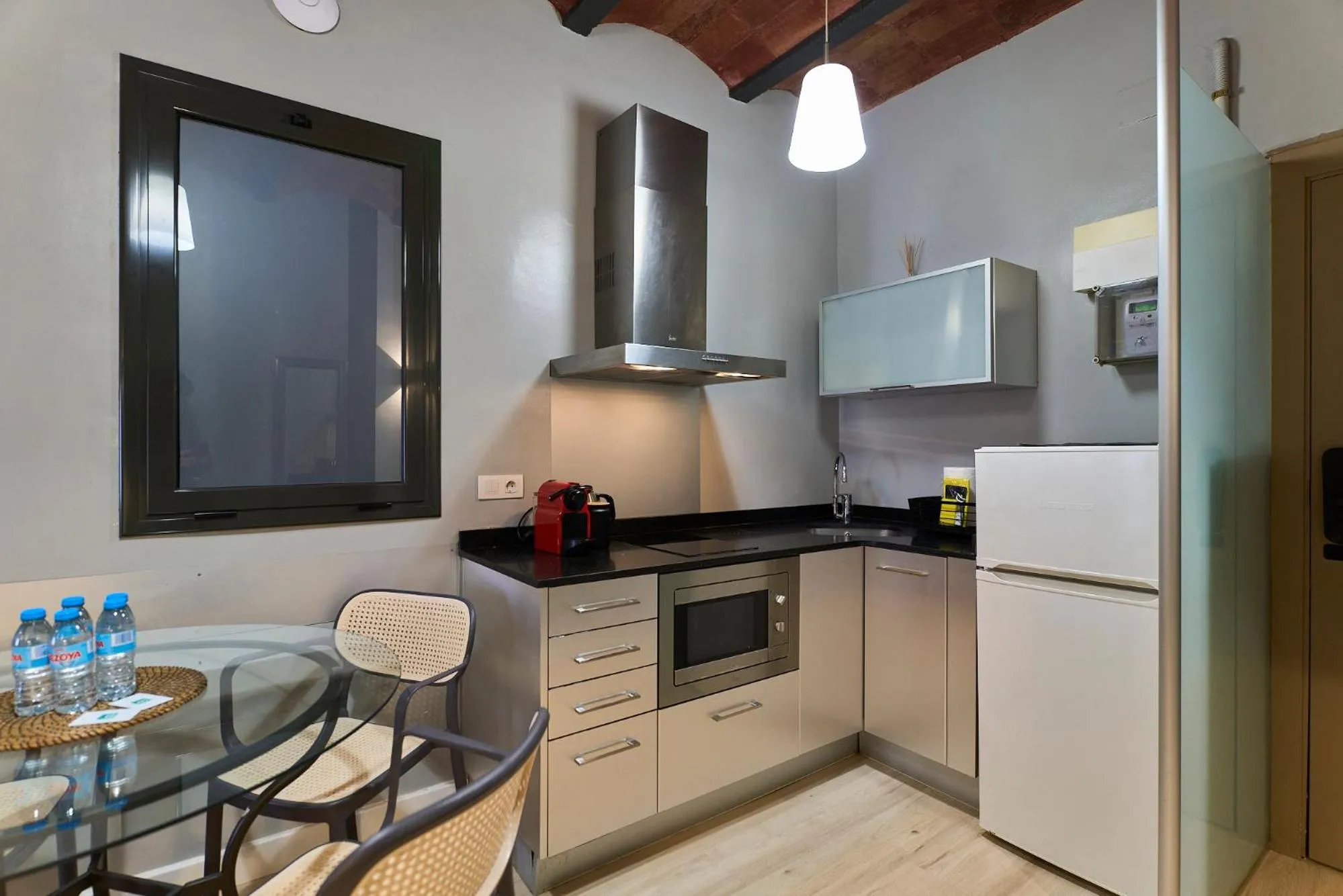 Kitchen or kitchenette in Fira Apartments by gaiarooms