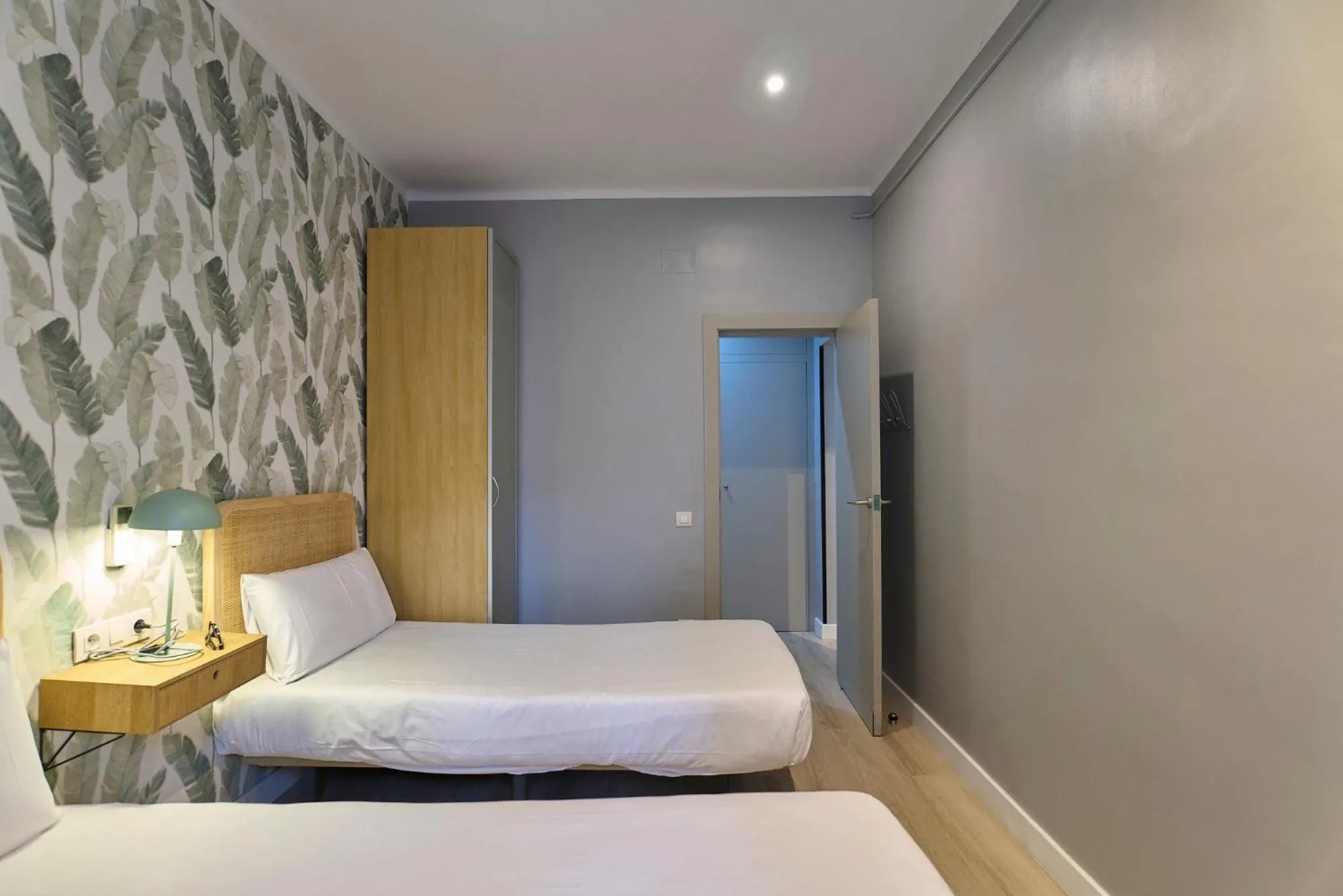 Bed in Fira Apartments by gaiarooms