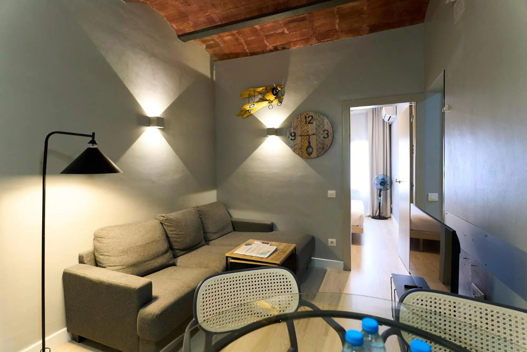 Living room in Fira Apartments by gaiarooms