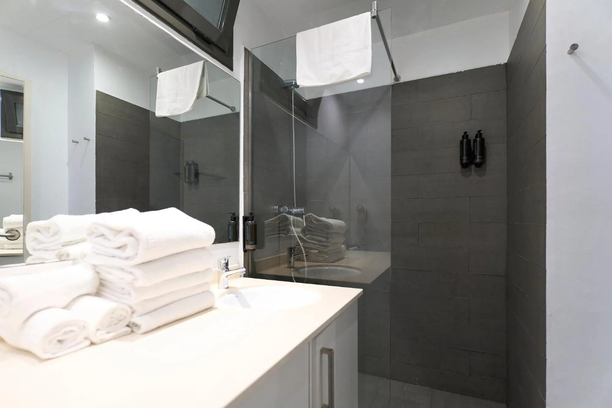 Shower in Fira Apartments by gaiarooms