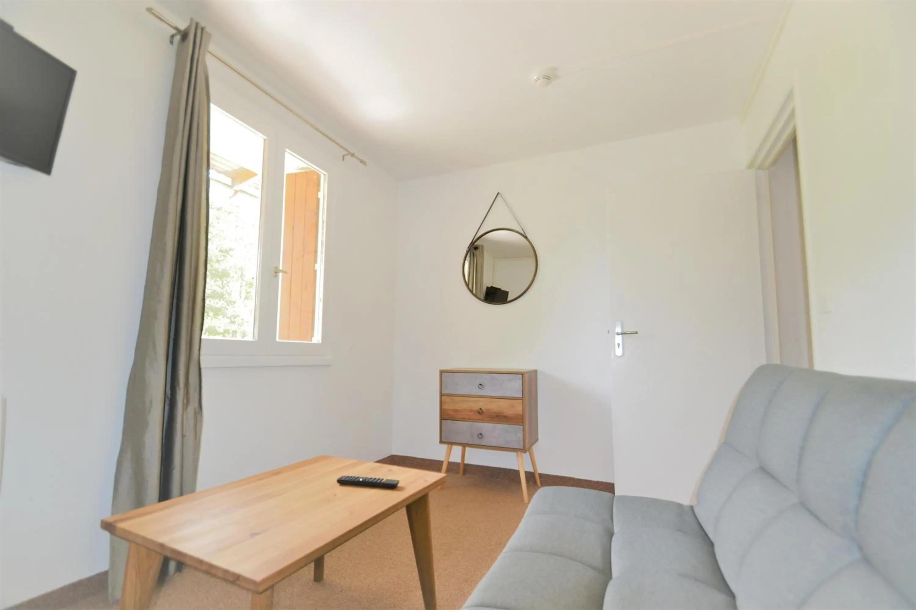 Living room in Hôtel Le Martagon
