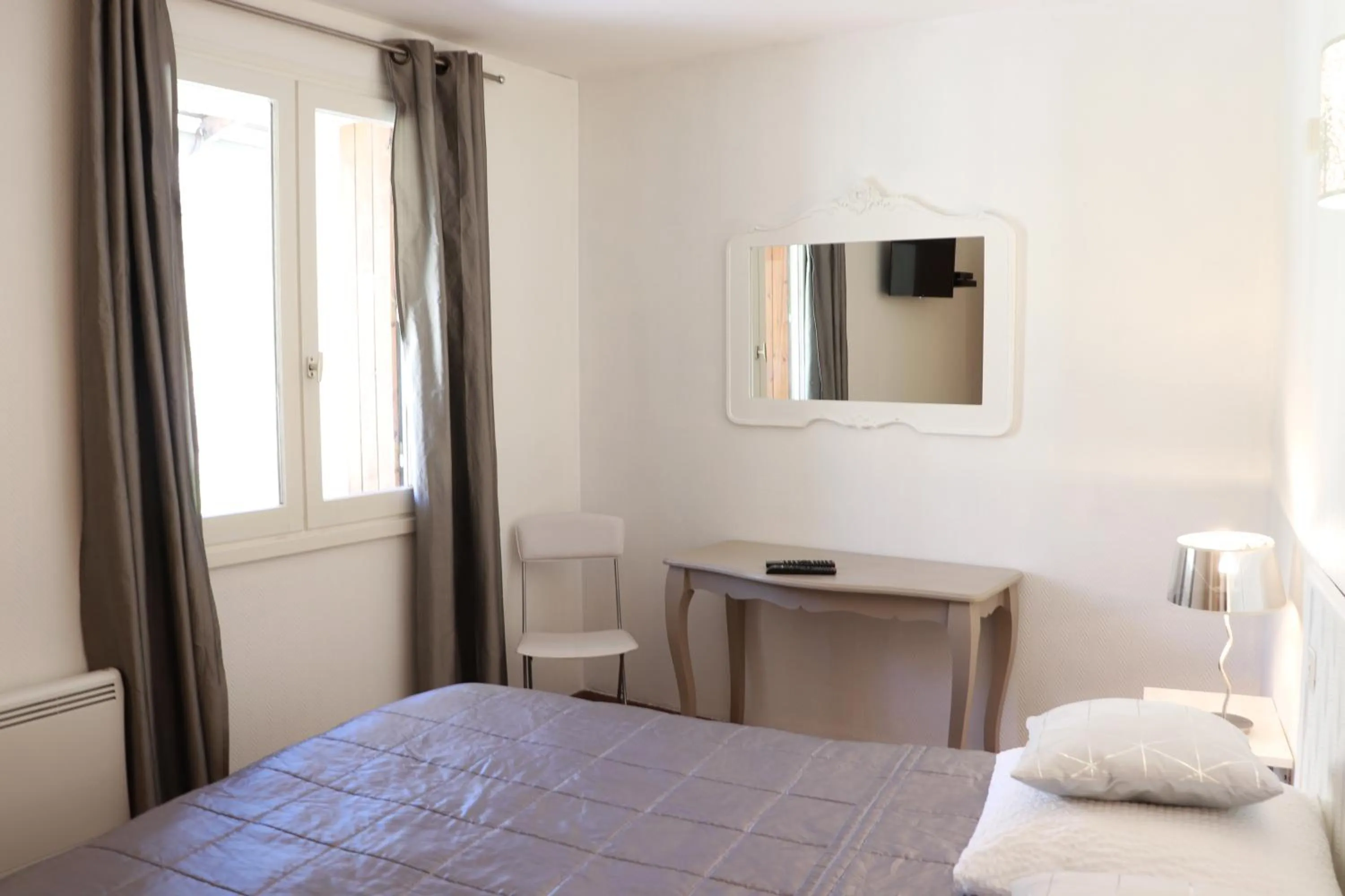 Photo of the whole room, Bed in Hôtel Le Martagon