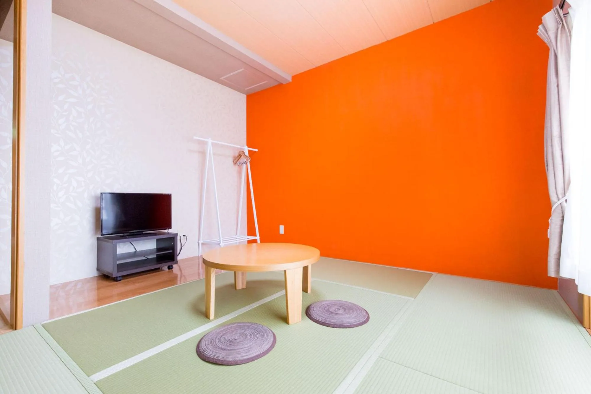 TV and multimedia, Bed in Seaside Pension Petit Shirahama