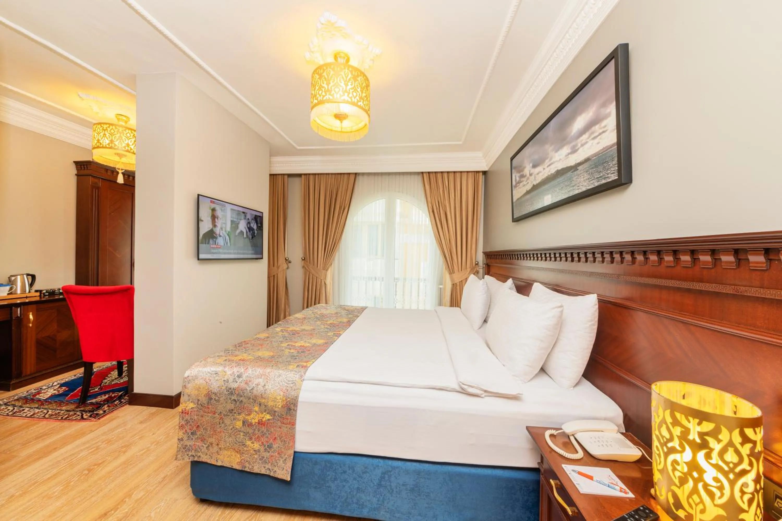 Bed in The Magnaura Palace Hotel