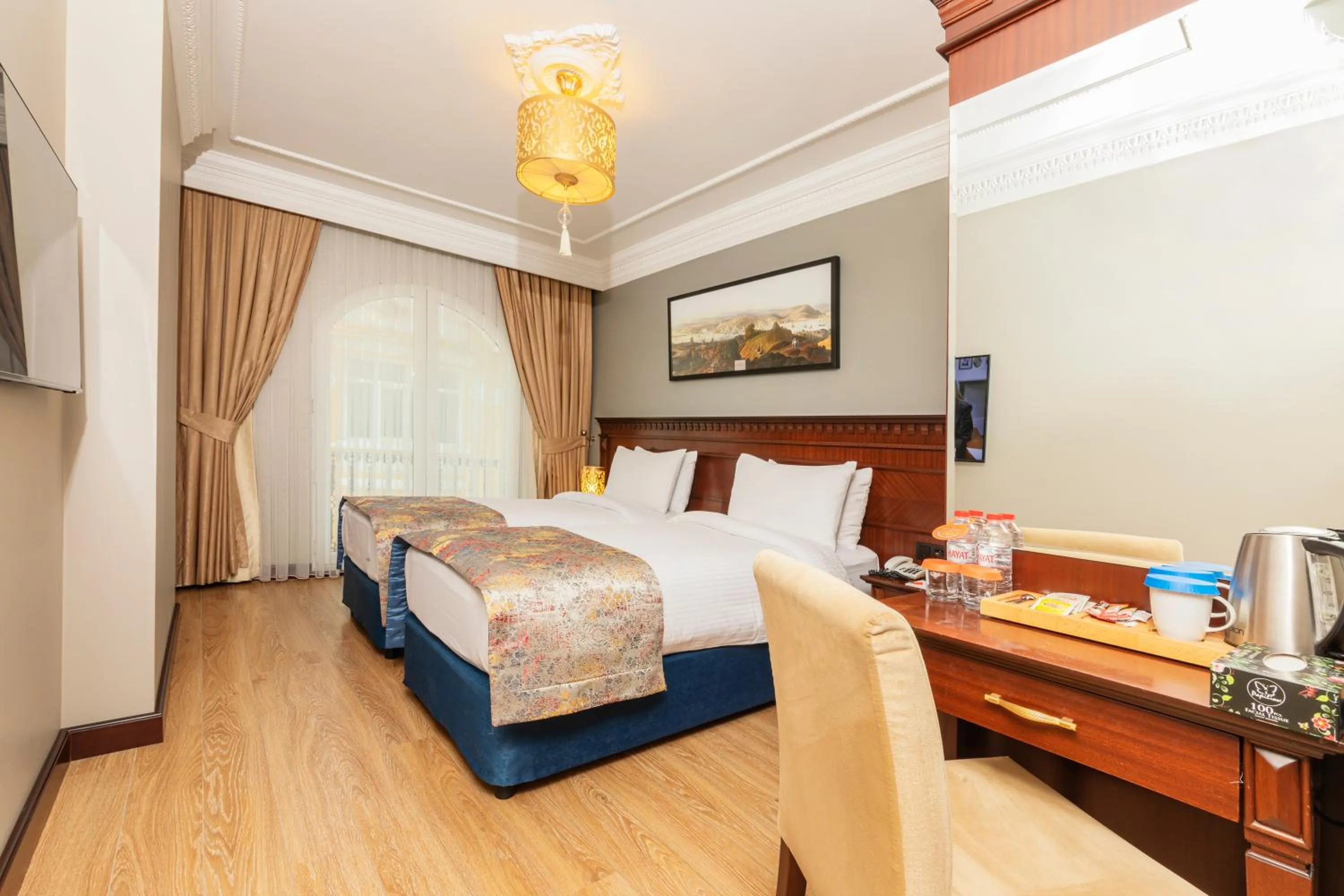 Bed in The Magnaura Palace Hotel