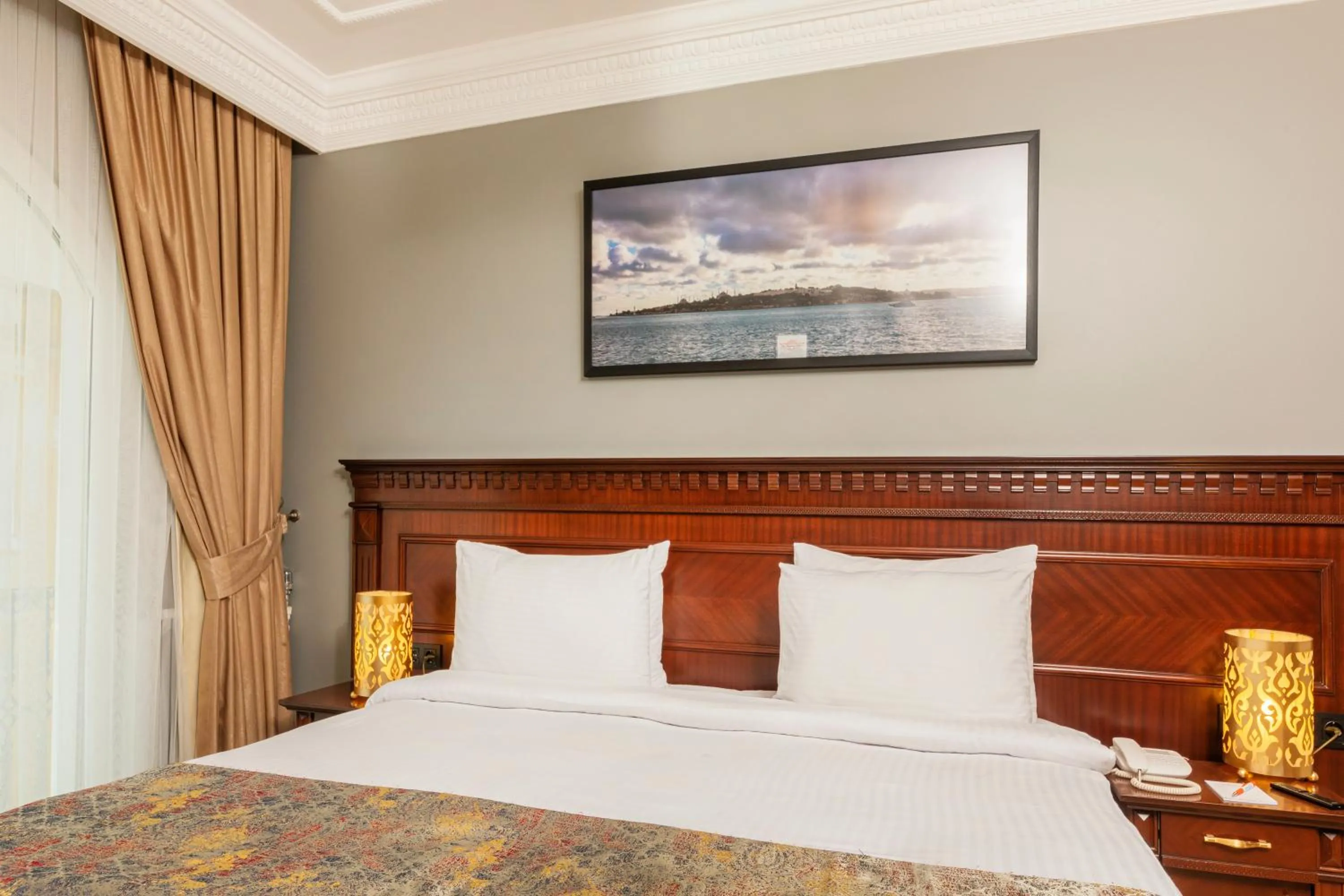 Bed in The Magnaura Palace Hotel