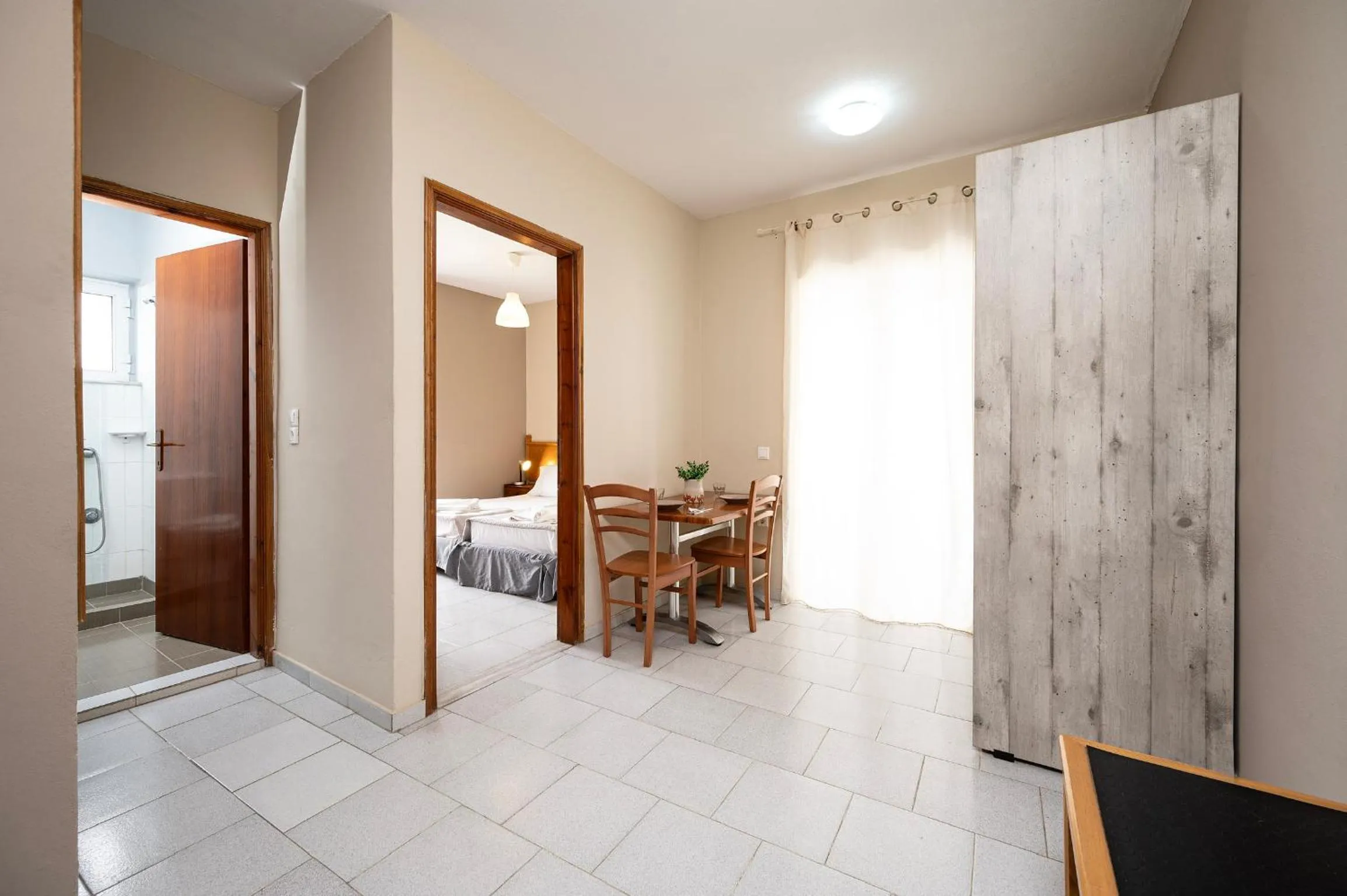 Kitchen or kitchenette, Bed in Manias Apartments