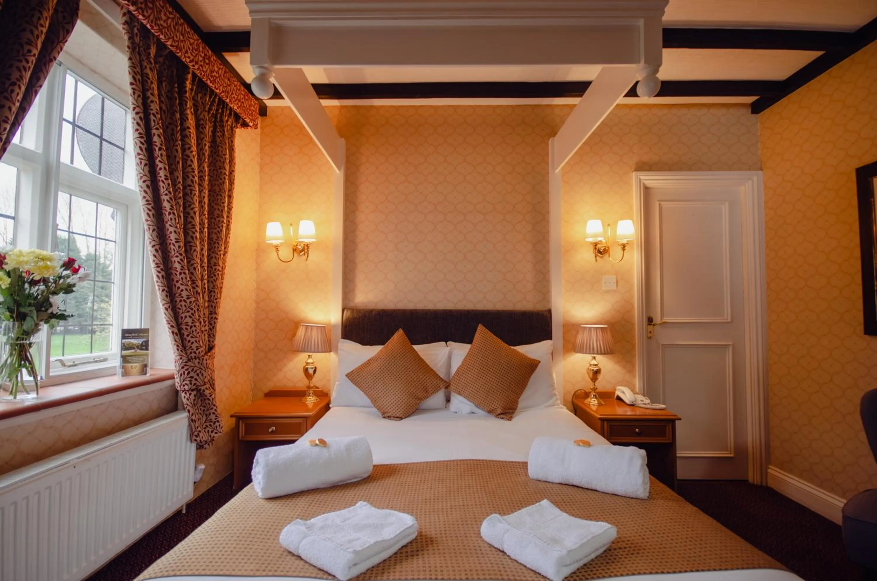 Bed in Howfield Manor Hotel