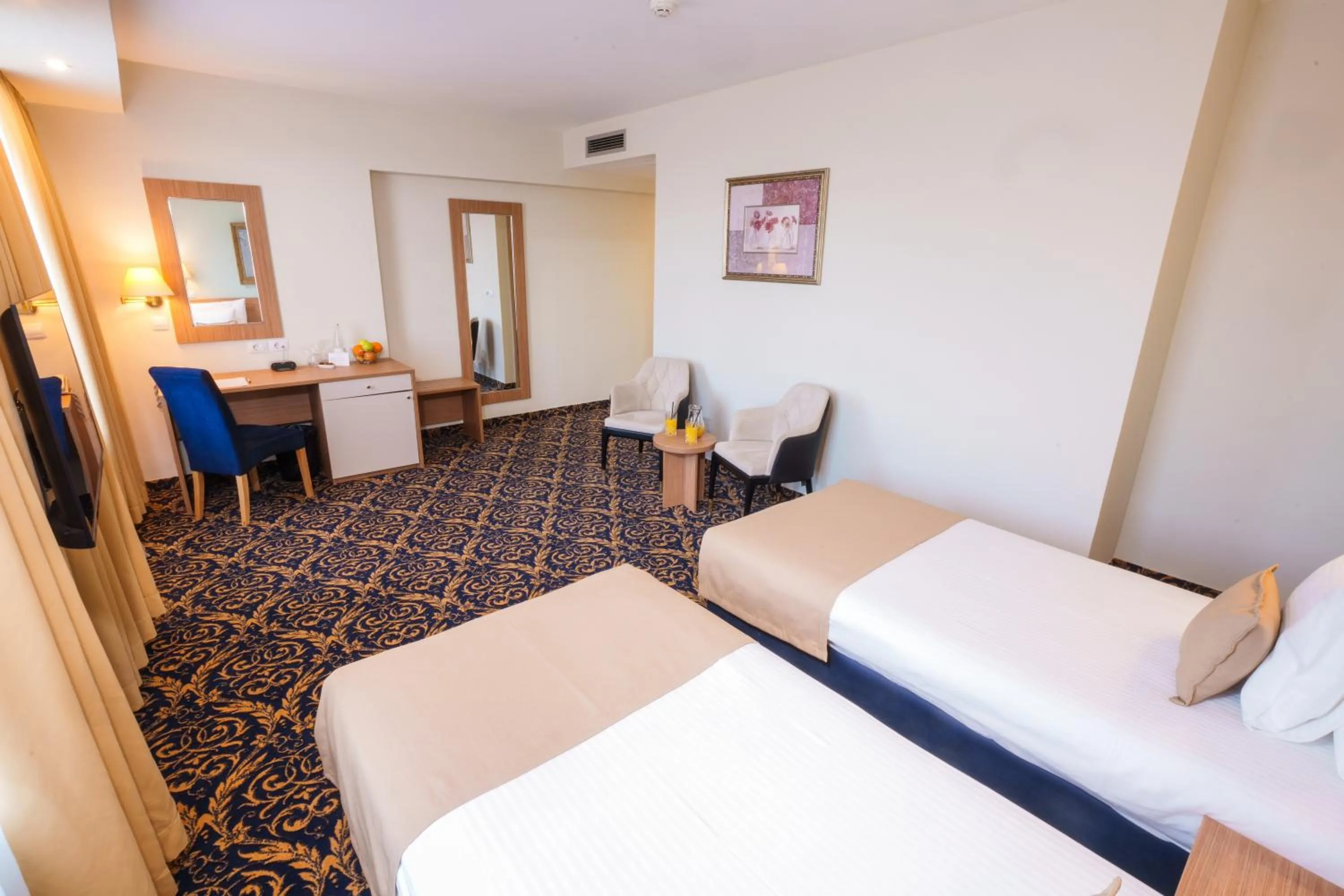 Bed in Hotel Monogram Park