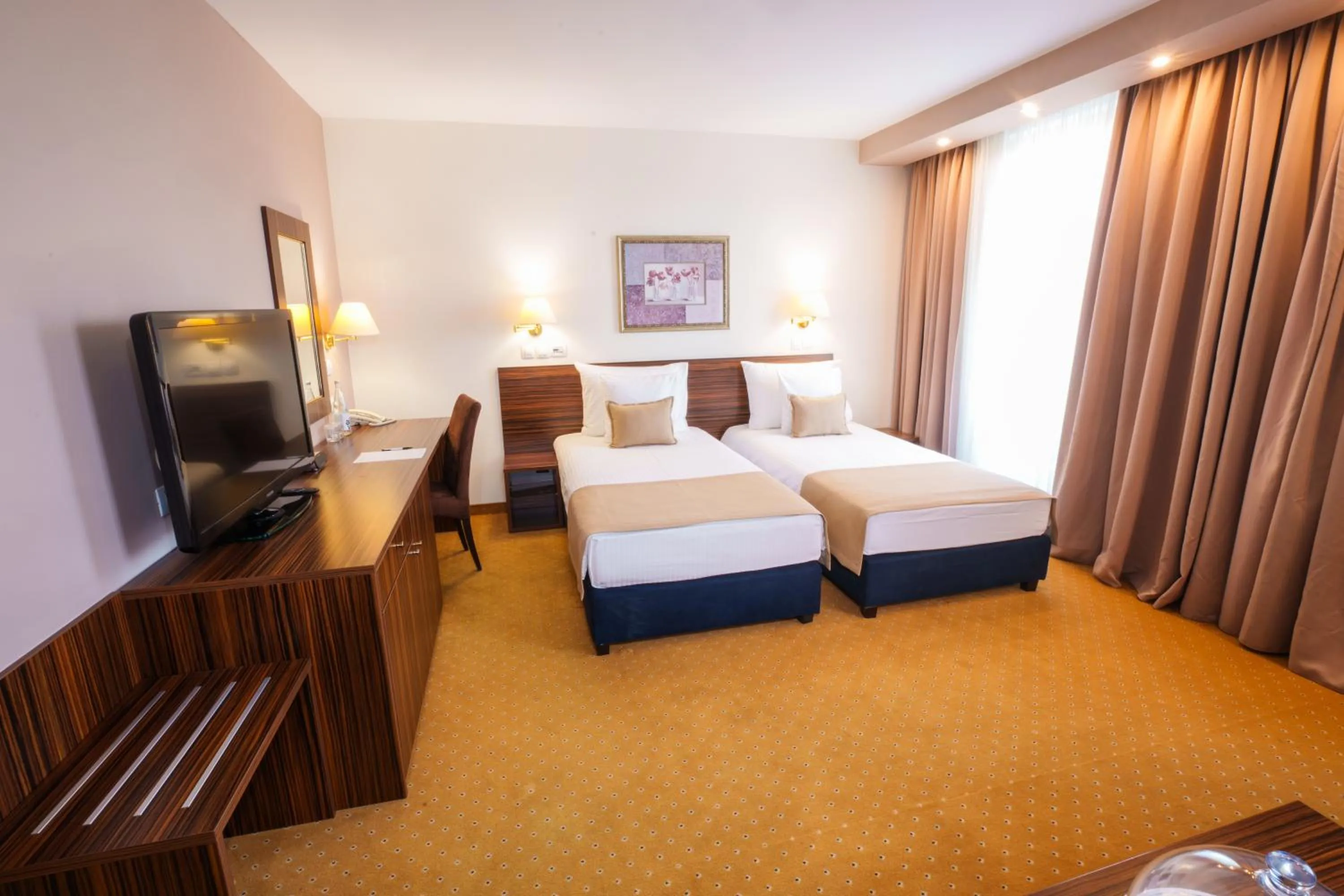 Bed in Hotel Monogram Park