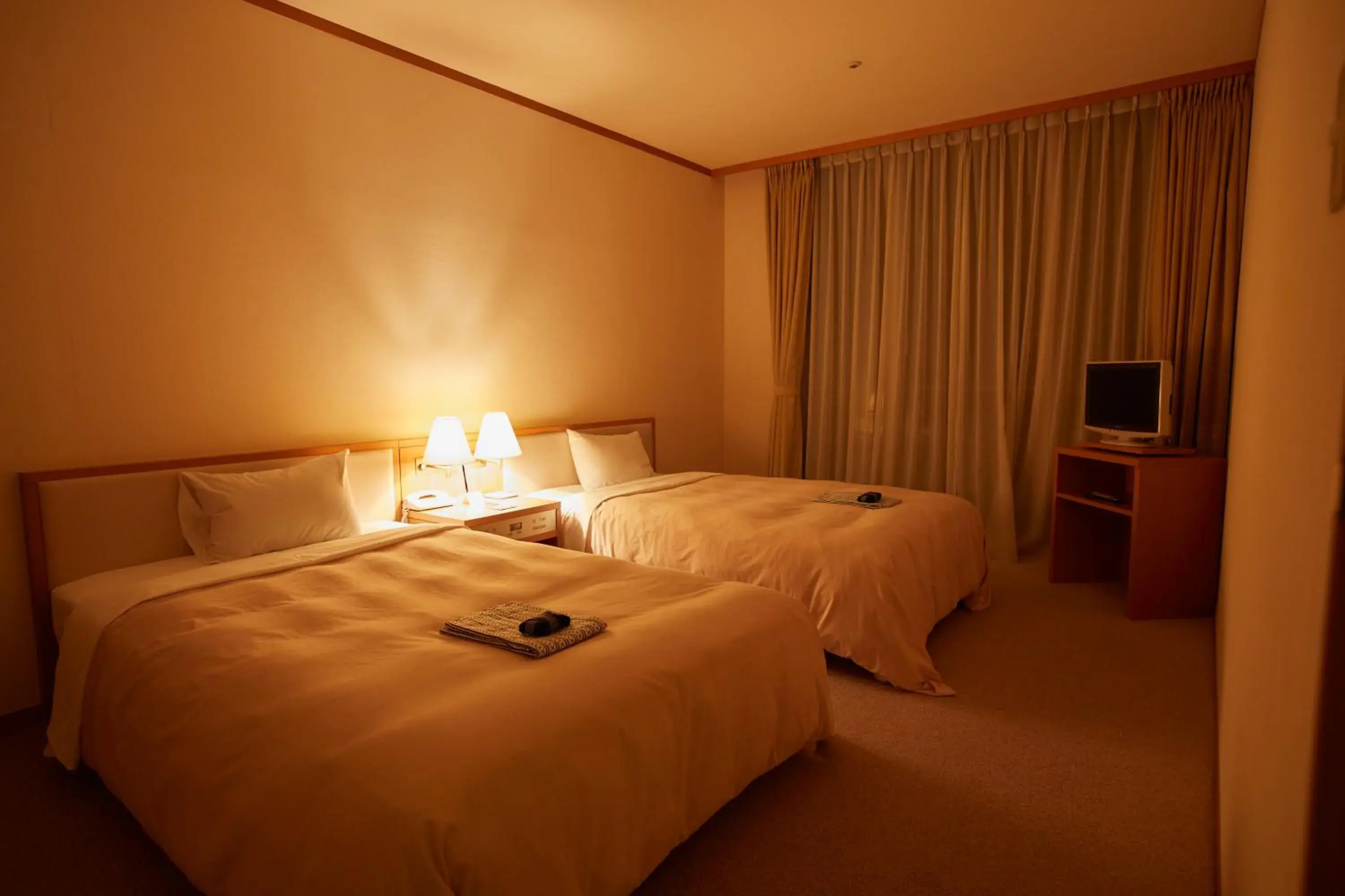 Bed in Kamogawa Country Hotel Bed in Kamogawa Country Hotel