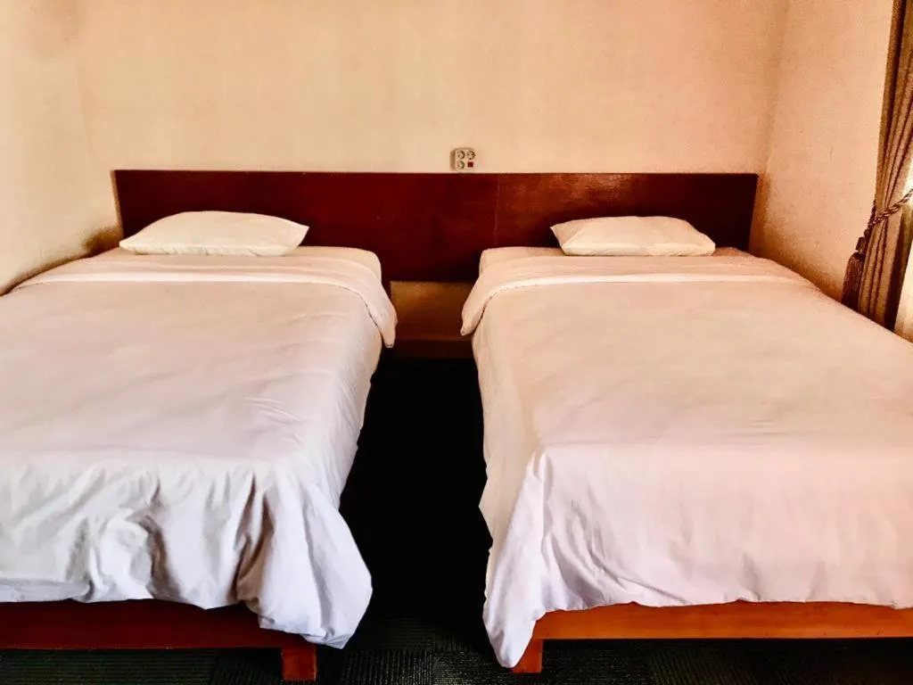 Bed in Penginapan Intan Bandara