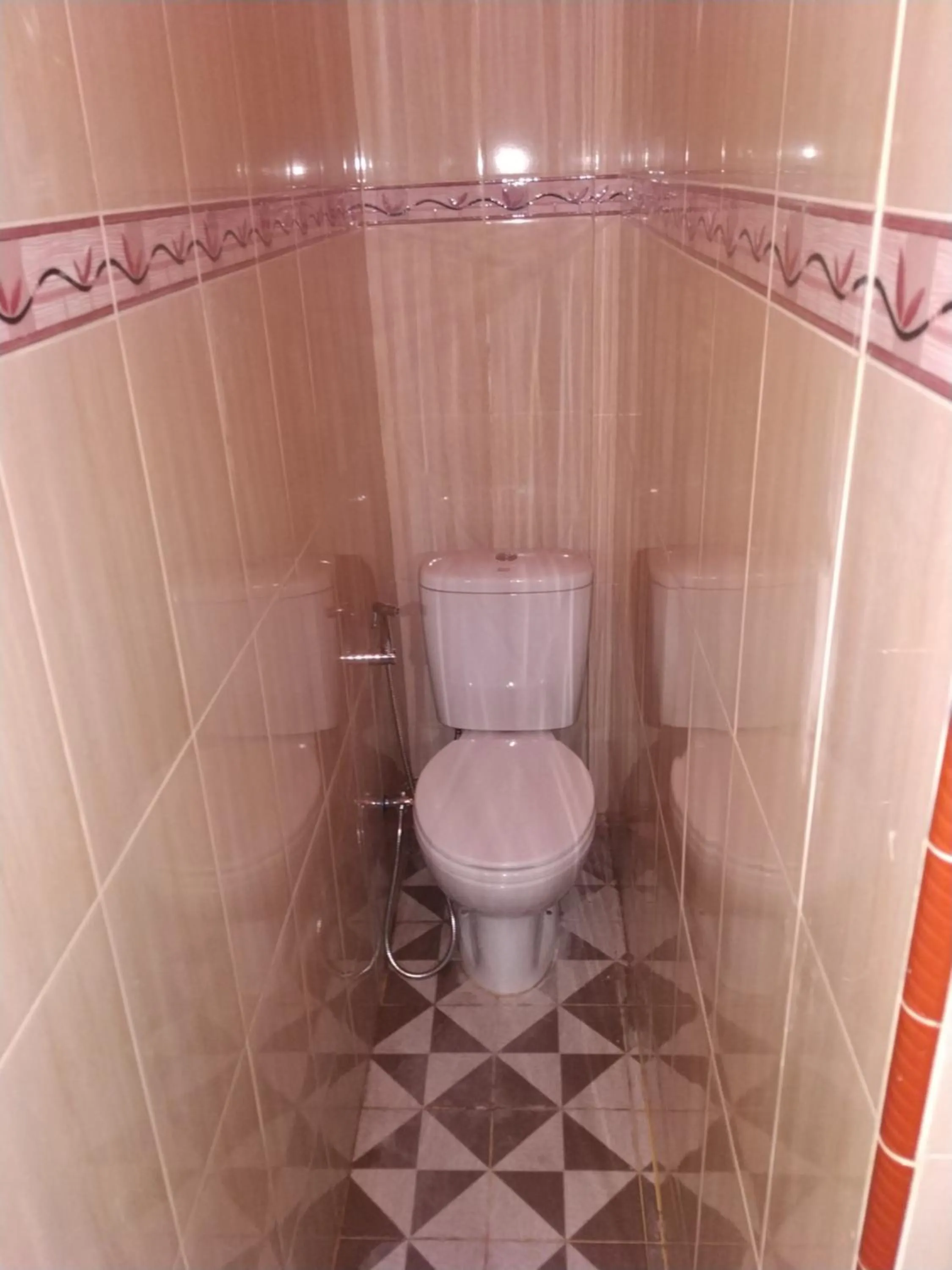 Bed in Penginapan Intan Bandara