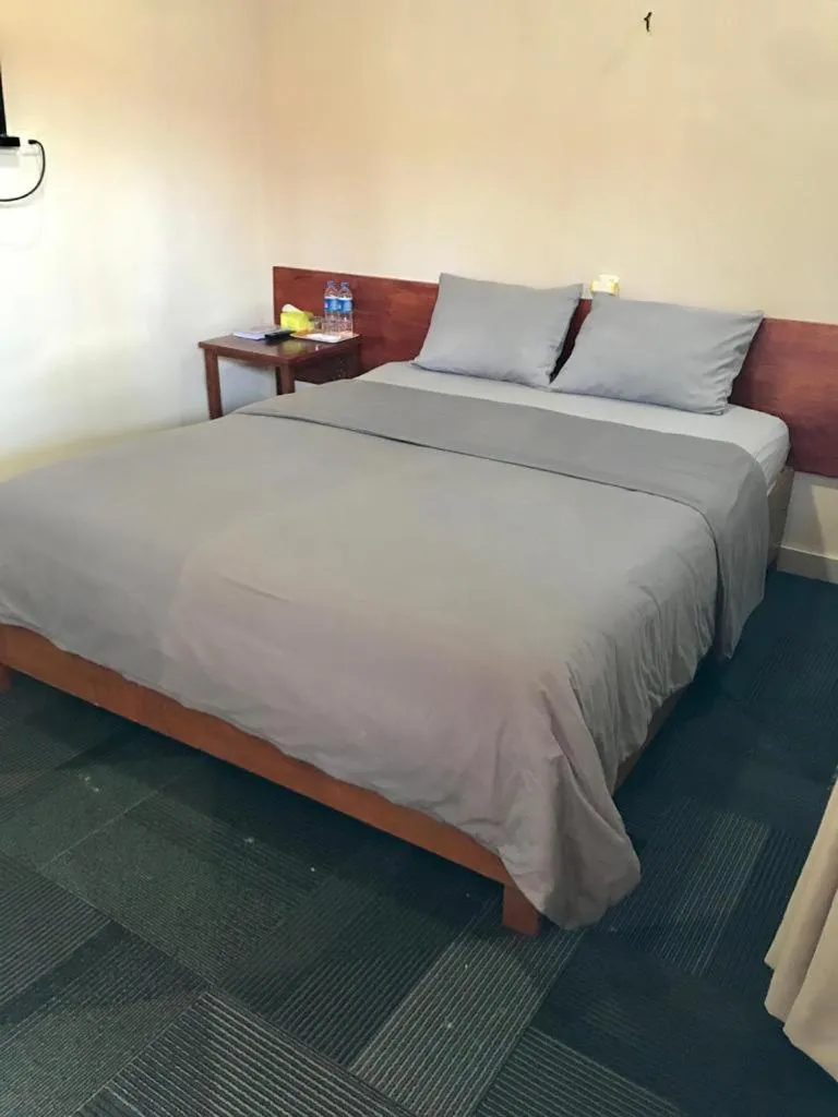 Bed in Penginapan Intan Bandara