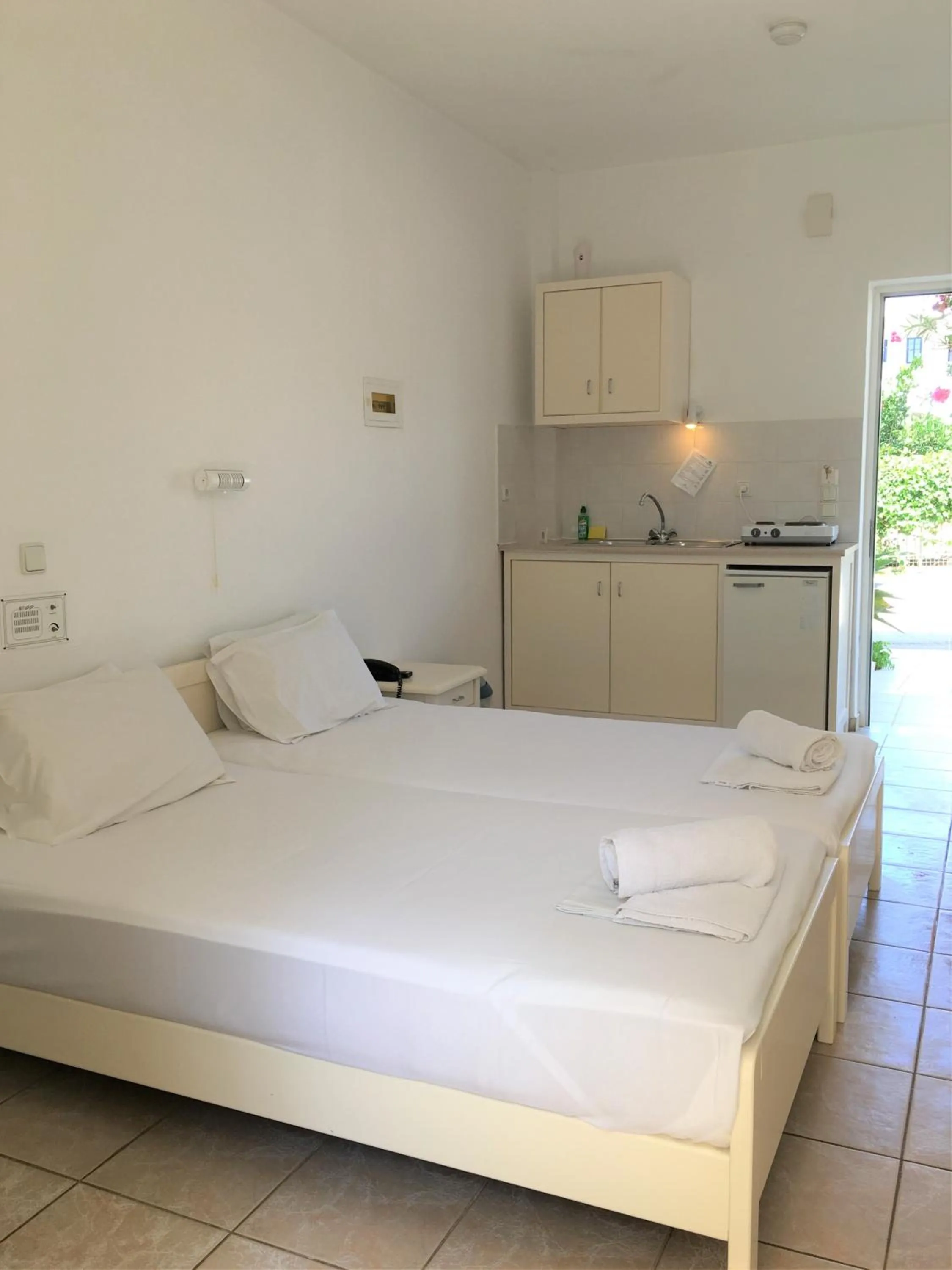 Bed in Dimitra & Evdokia Hotel