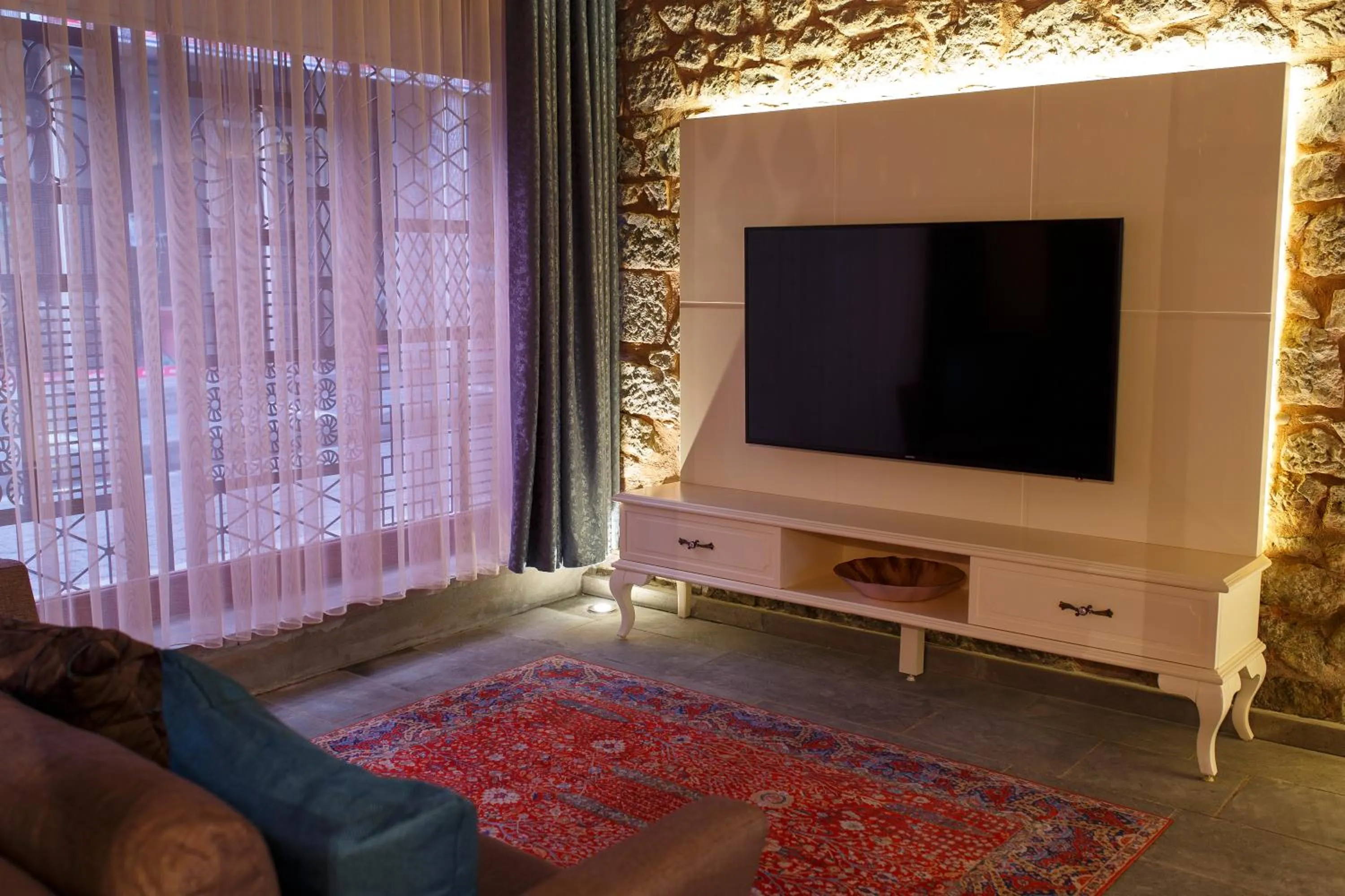 Communal lounge/ TV room in Verula City Luxury Villa