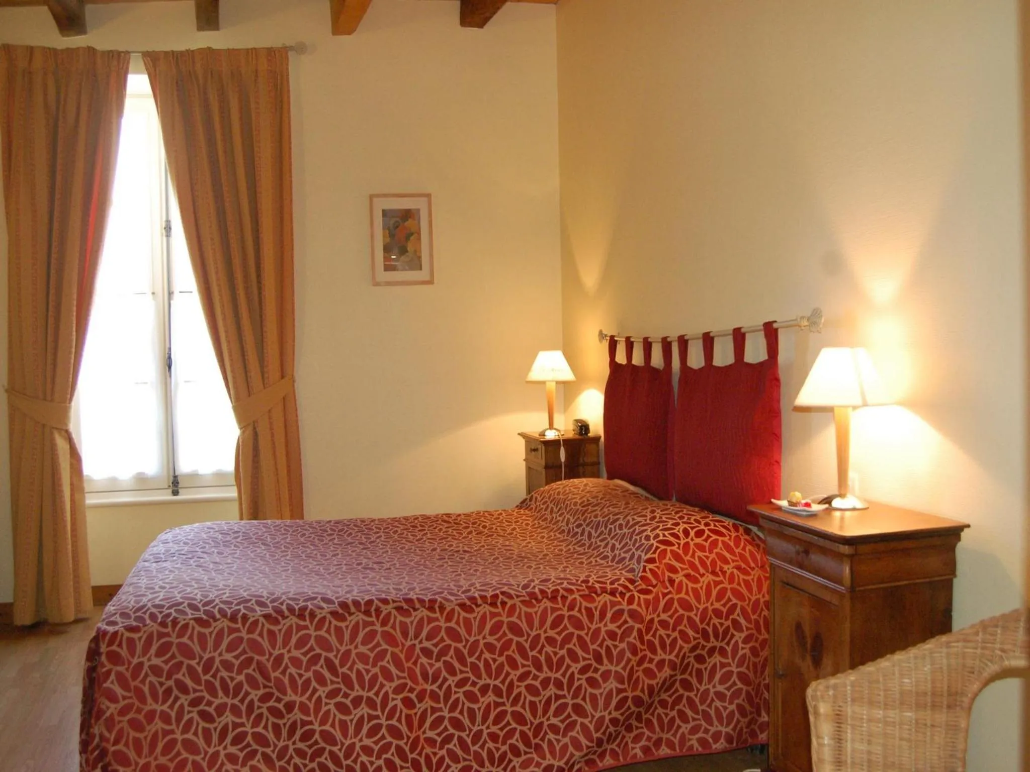 Bed in Hôtel du Donjon