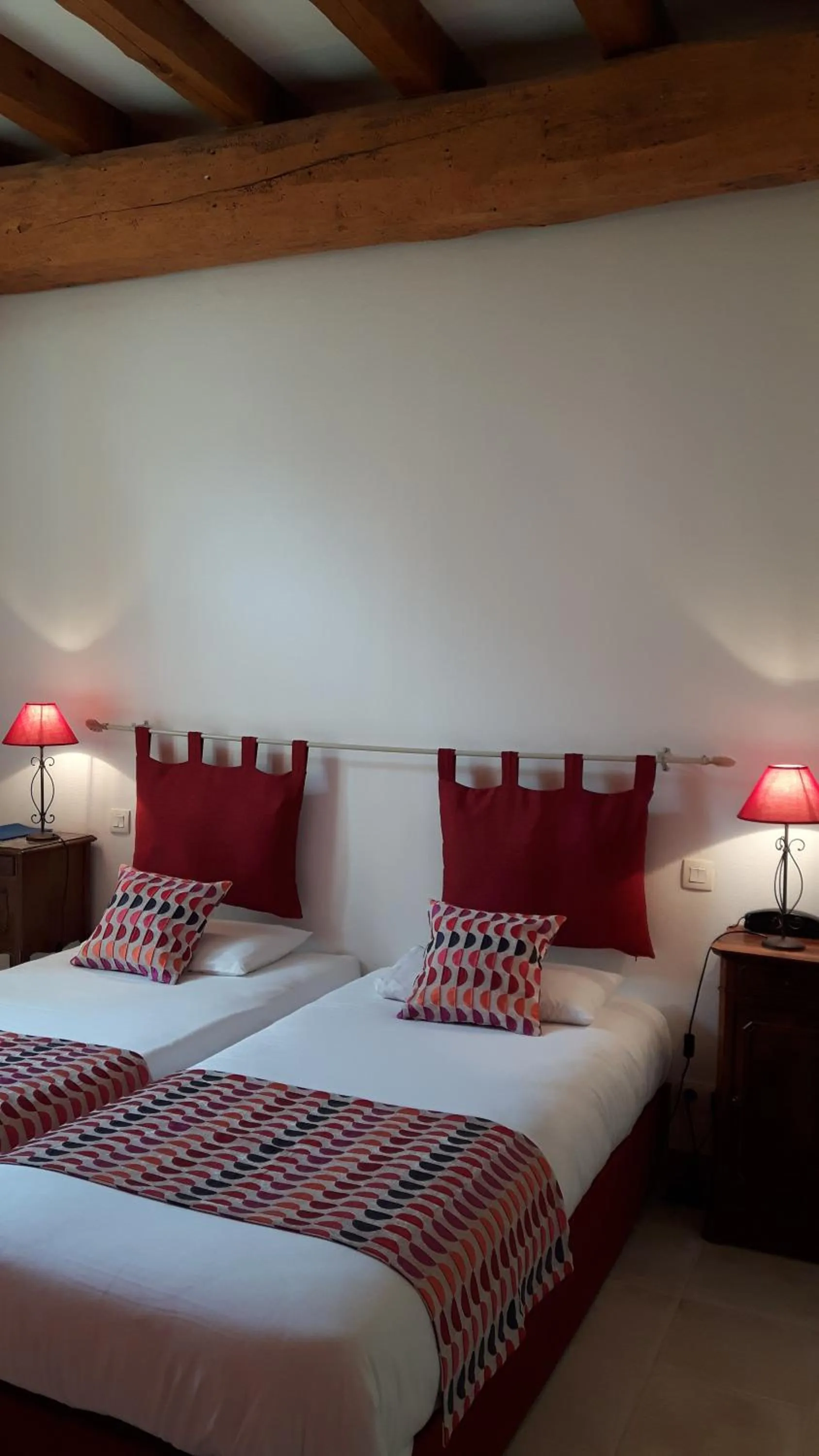 Bed in Hôtel du Donjon