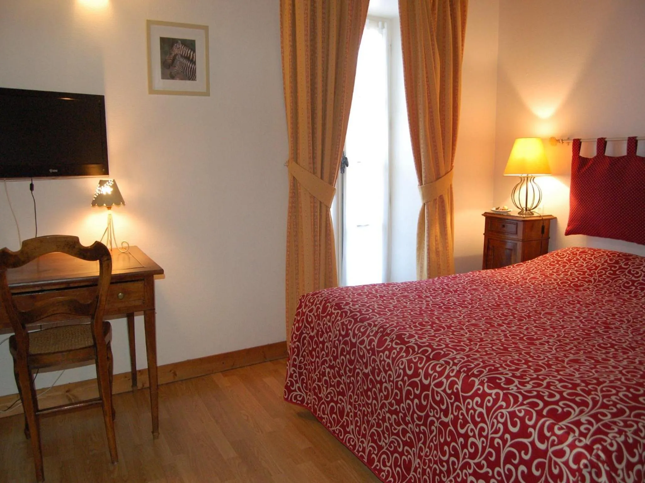 Bed in Hôtel du Donjon